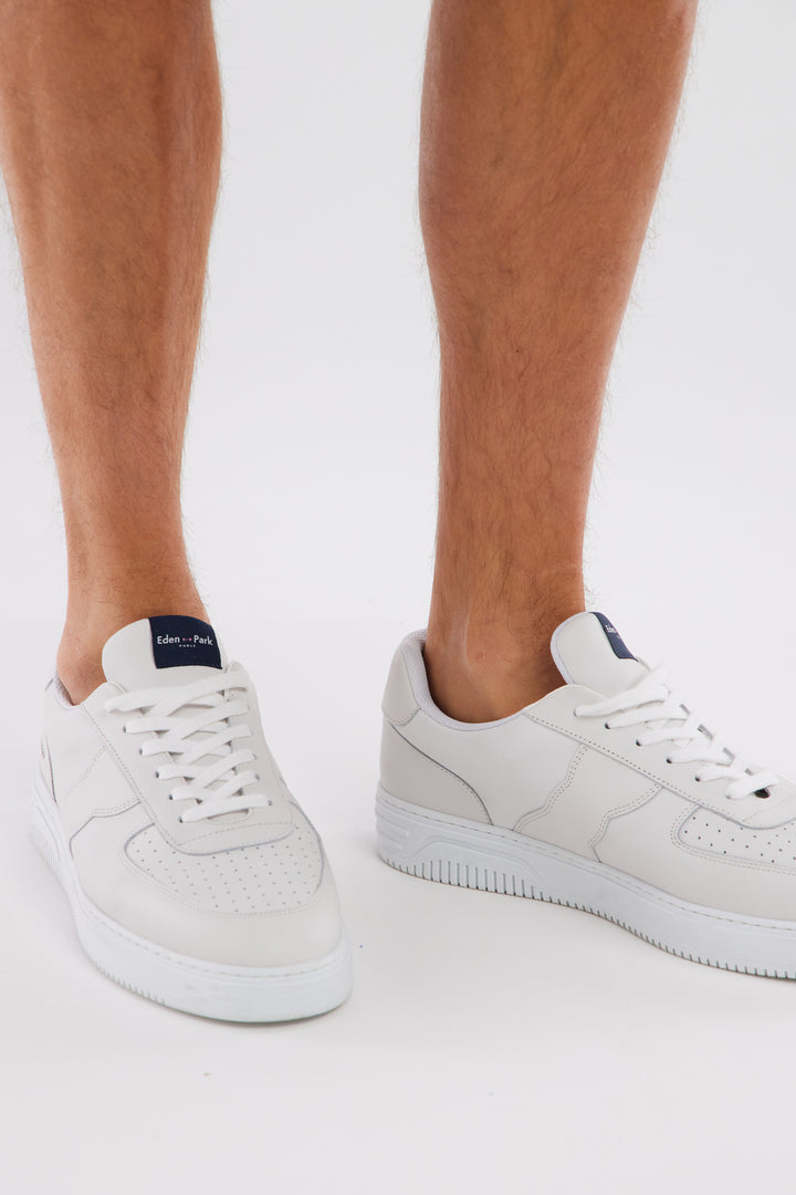 Sneakers en cuir perforé blanches