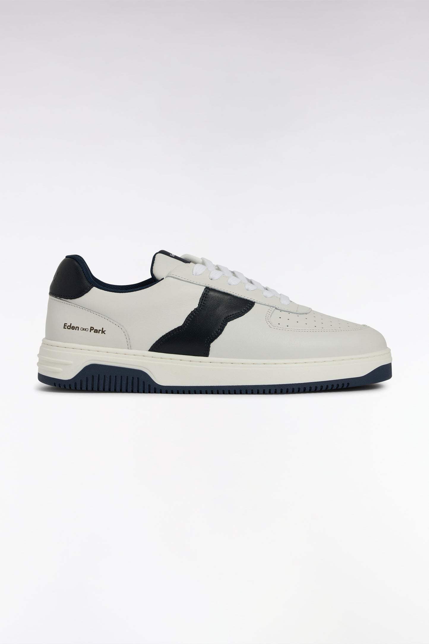 White leather sneakers with black details