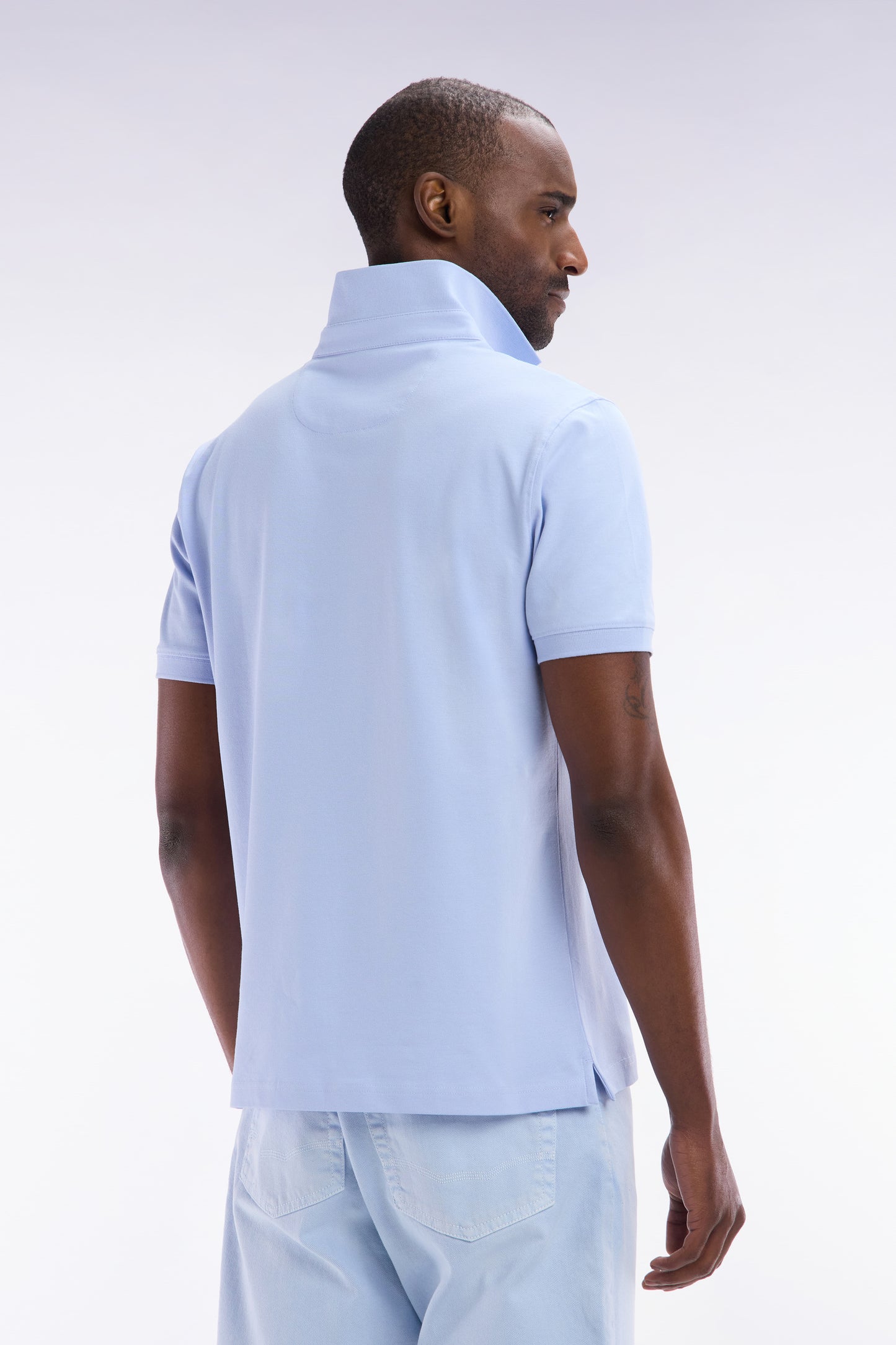 Slim-fit short-sleeved polo shirt in light blue stretch cotton piqué
