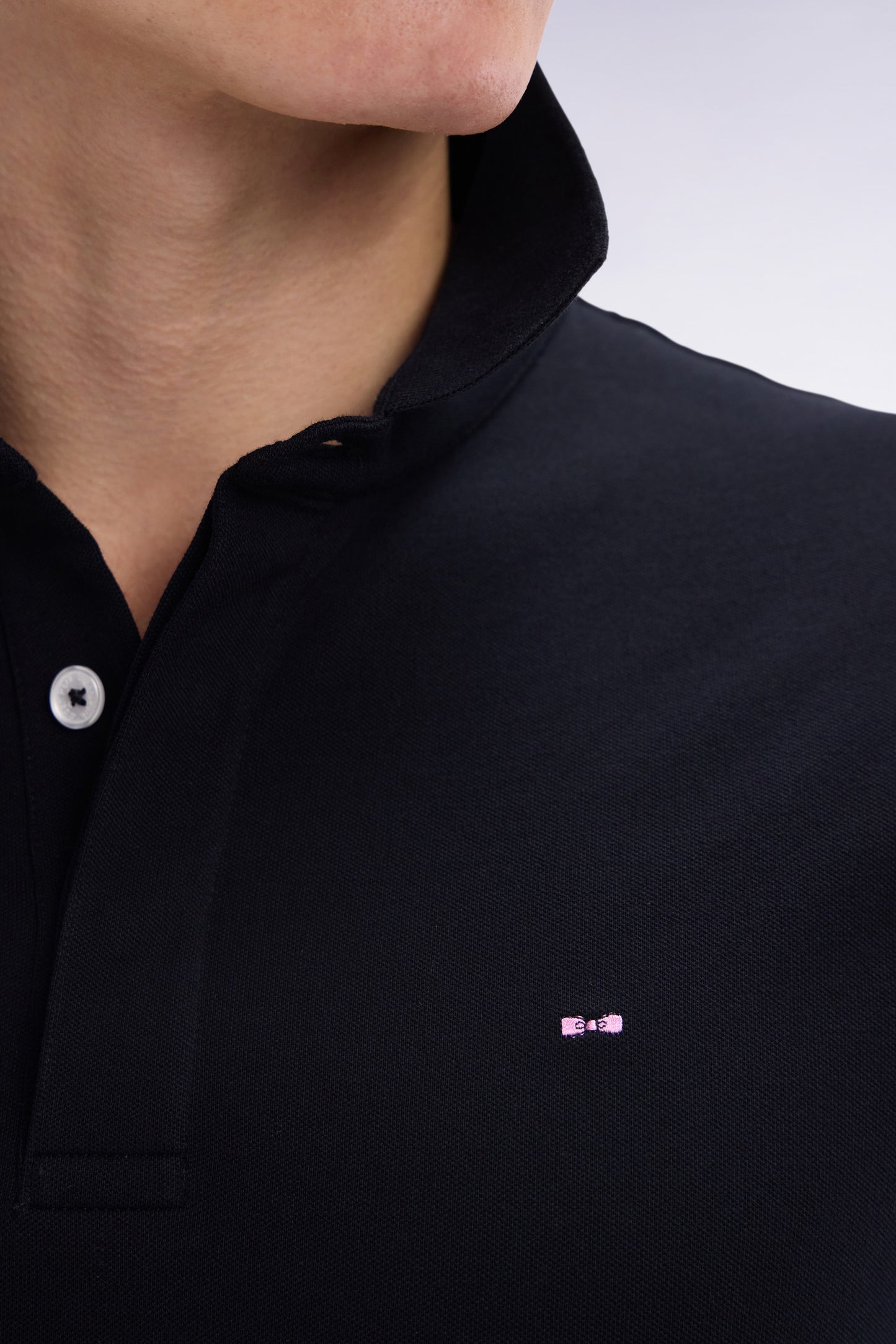 Slim-fit short-sleeved polo shirt in salmon pink stretch cotton piqué