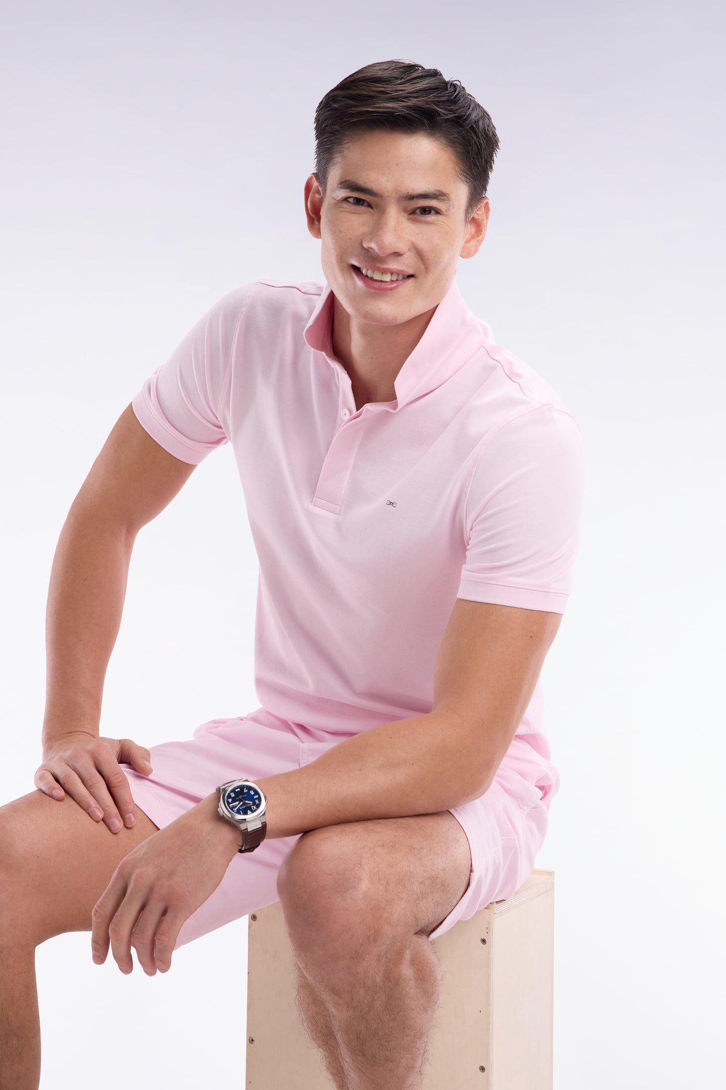 Slim-fit short-sleeved polo shirt in light pink stretch cotton piqué