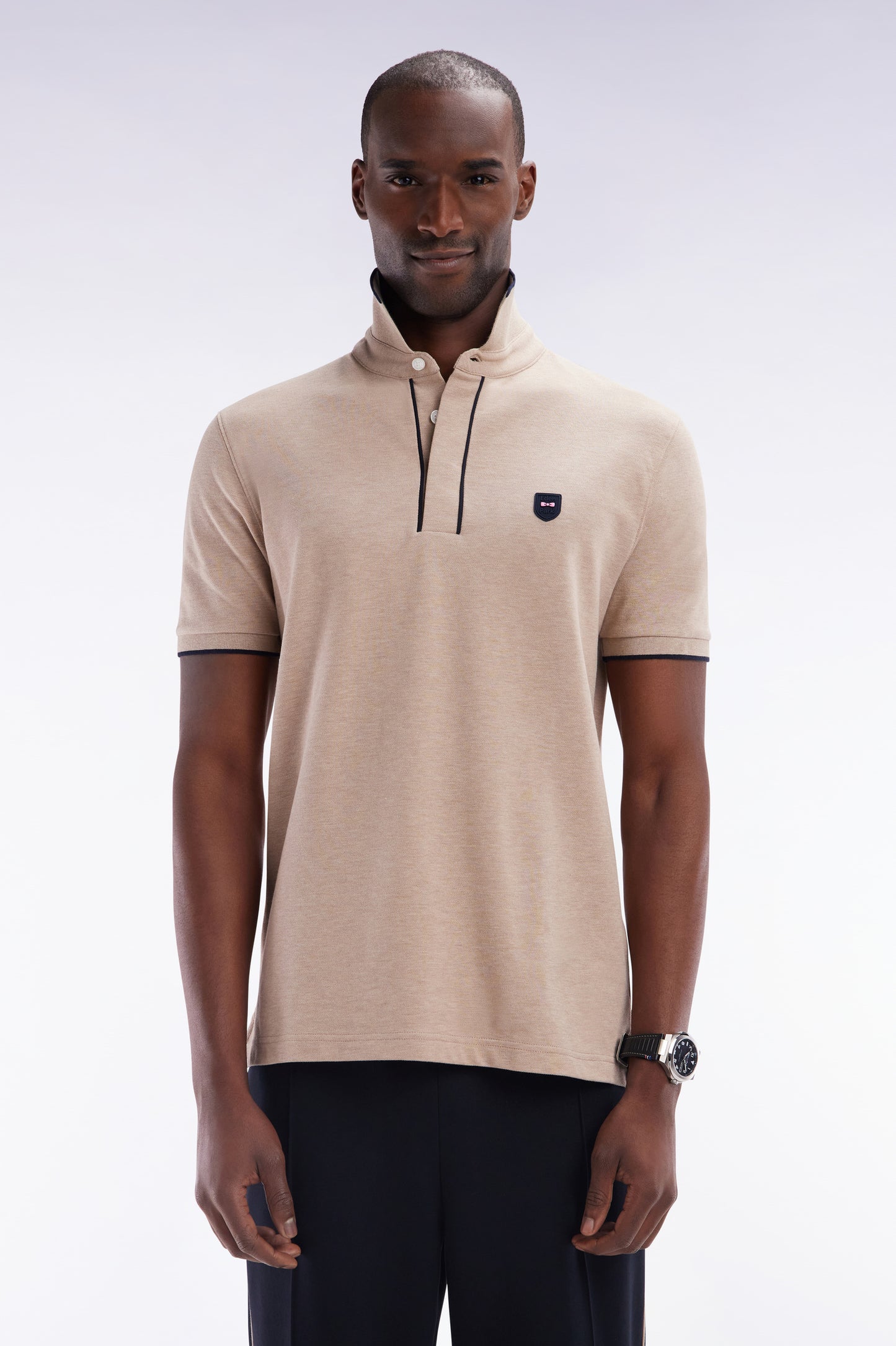 Slim-fit short-sleeved polo shirt in beige stretch cotton piqué