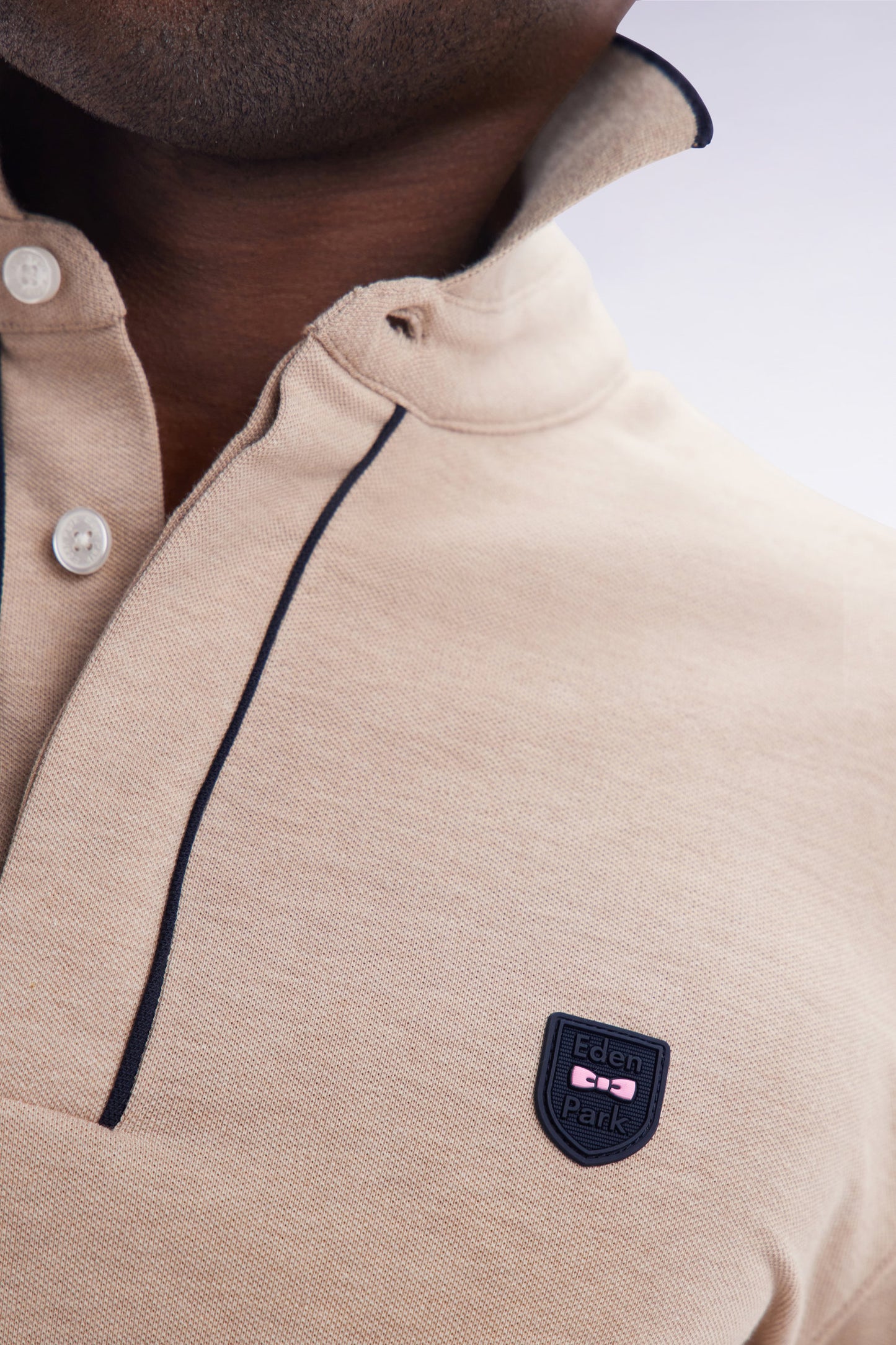 Slim-fit short-sleeved polo shirt in beige stretch cotton piqué