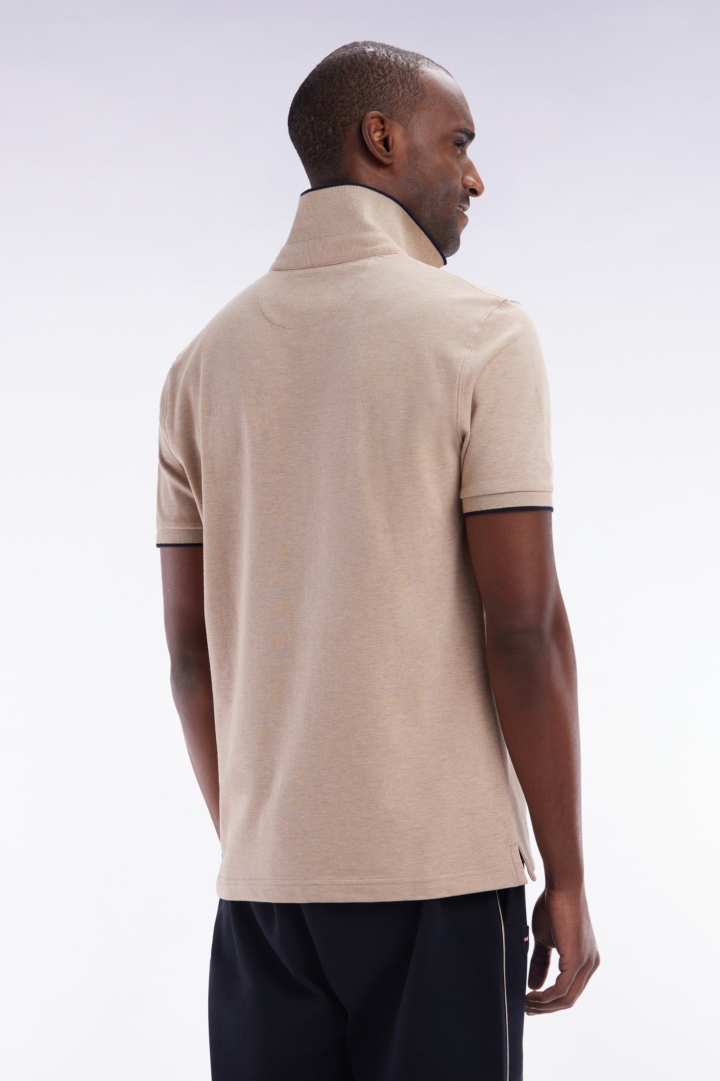 Slim-fit short-sleeved polo shirt in beige stretch cotton piqué