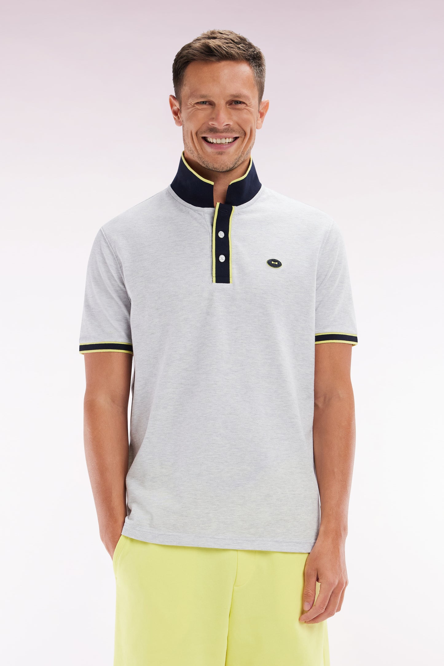 Relaxed-fit short-sleeved polo shirt in yellow cotton with colorful stripes