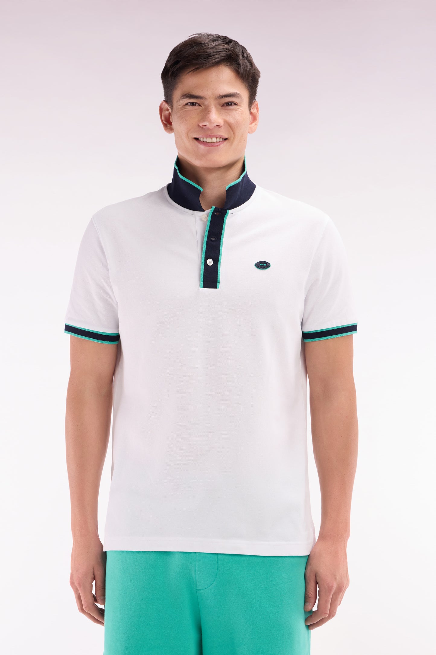 Relaxed-fit short-sleeved polo shirt in green cotton with colorful stripes