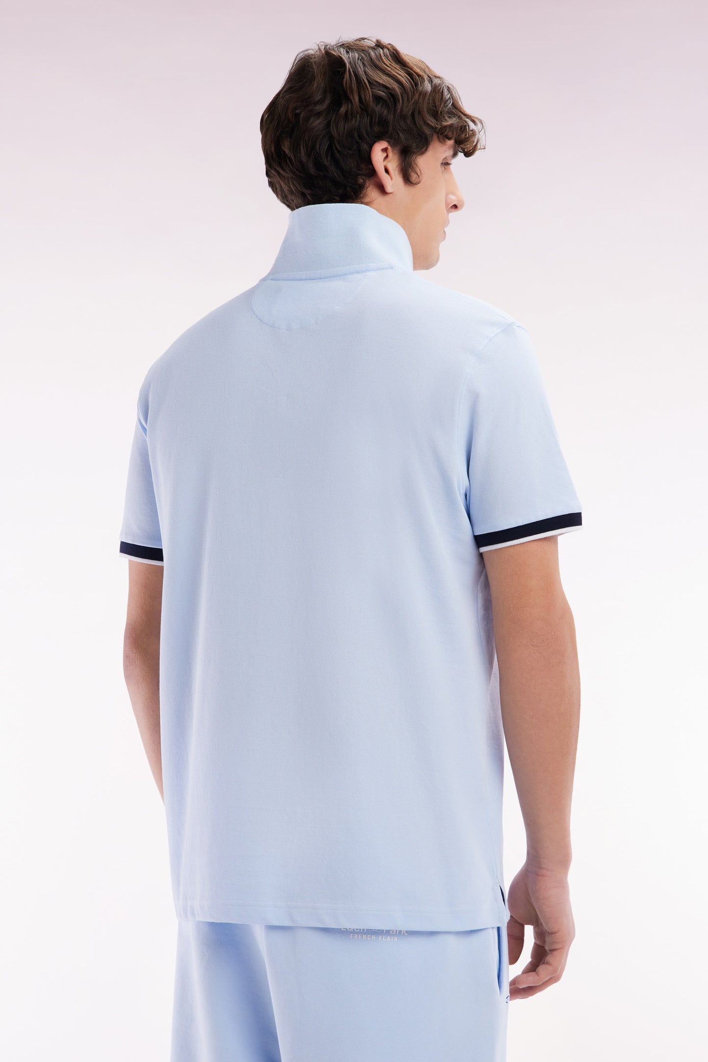 Relaxed-fit short-sleeved polo shirt in sky blue cotton with 10 embroidery