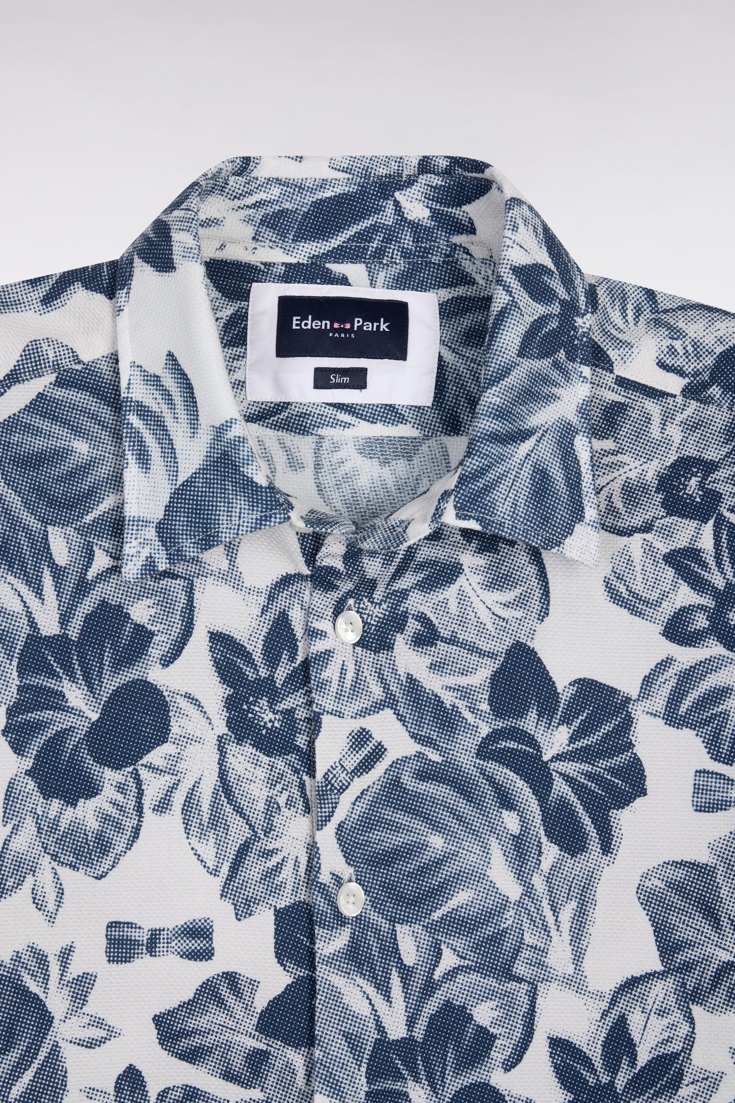 Chemise à manches courtes en piqué coton à motif floral marine coupe slim