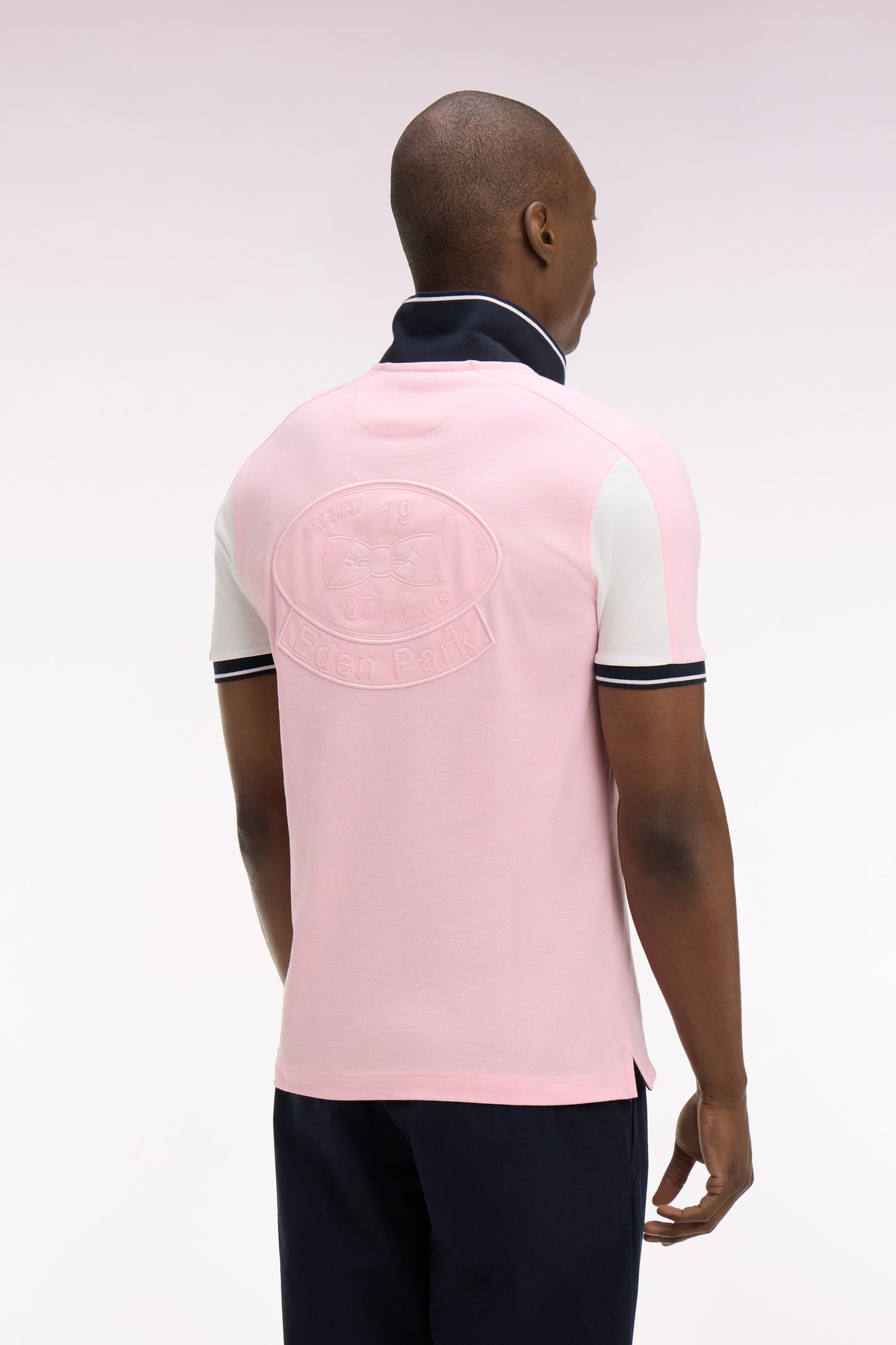 Polo à manches courtes en coton rose brodé coupe regular