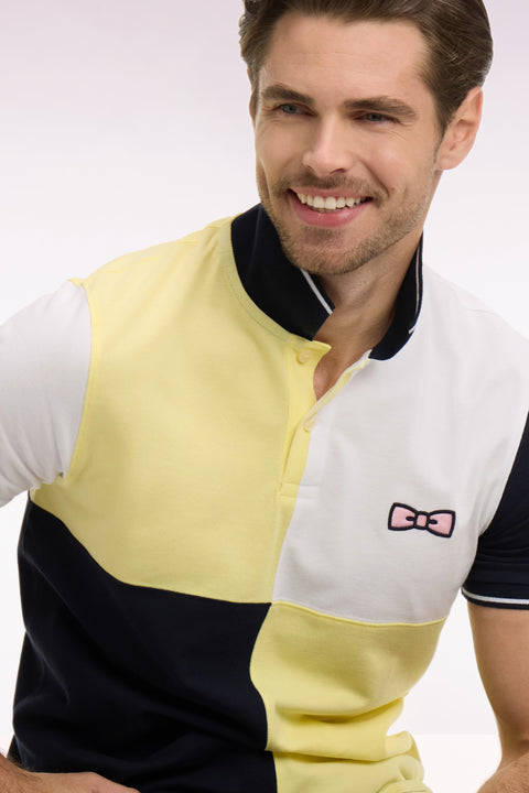 Polo à manches courtes en coton jaune clair à cadrans coupe regular - Image 1