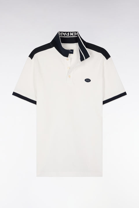 Polo à manches courtes en piqué coton écru à découpes marine - Image 2