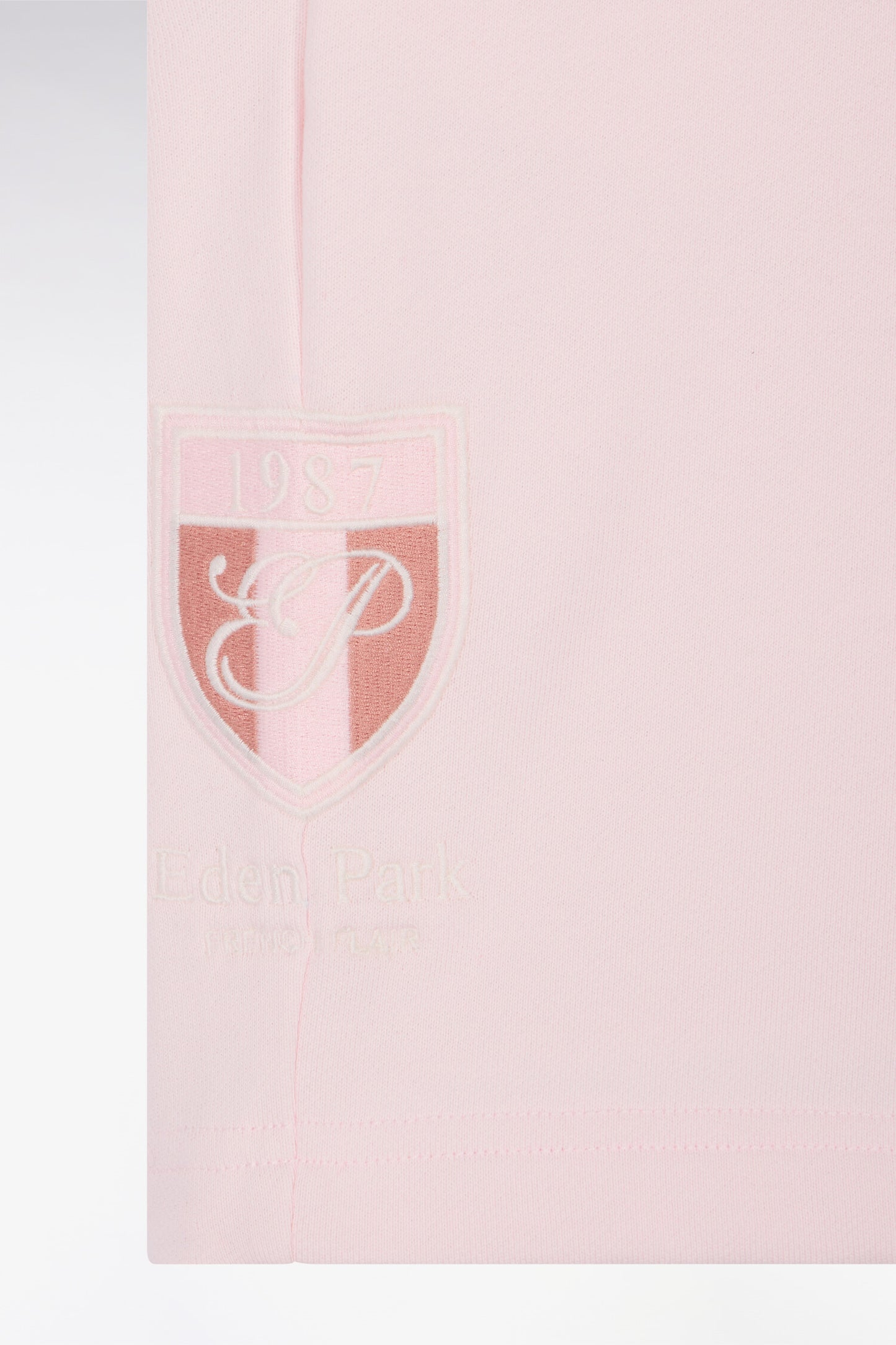 Short en molleton coton rose à broderie blason