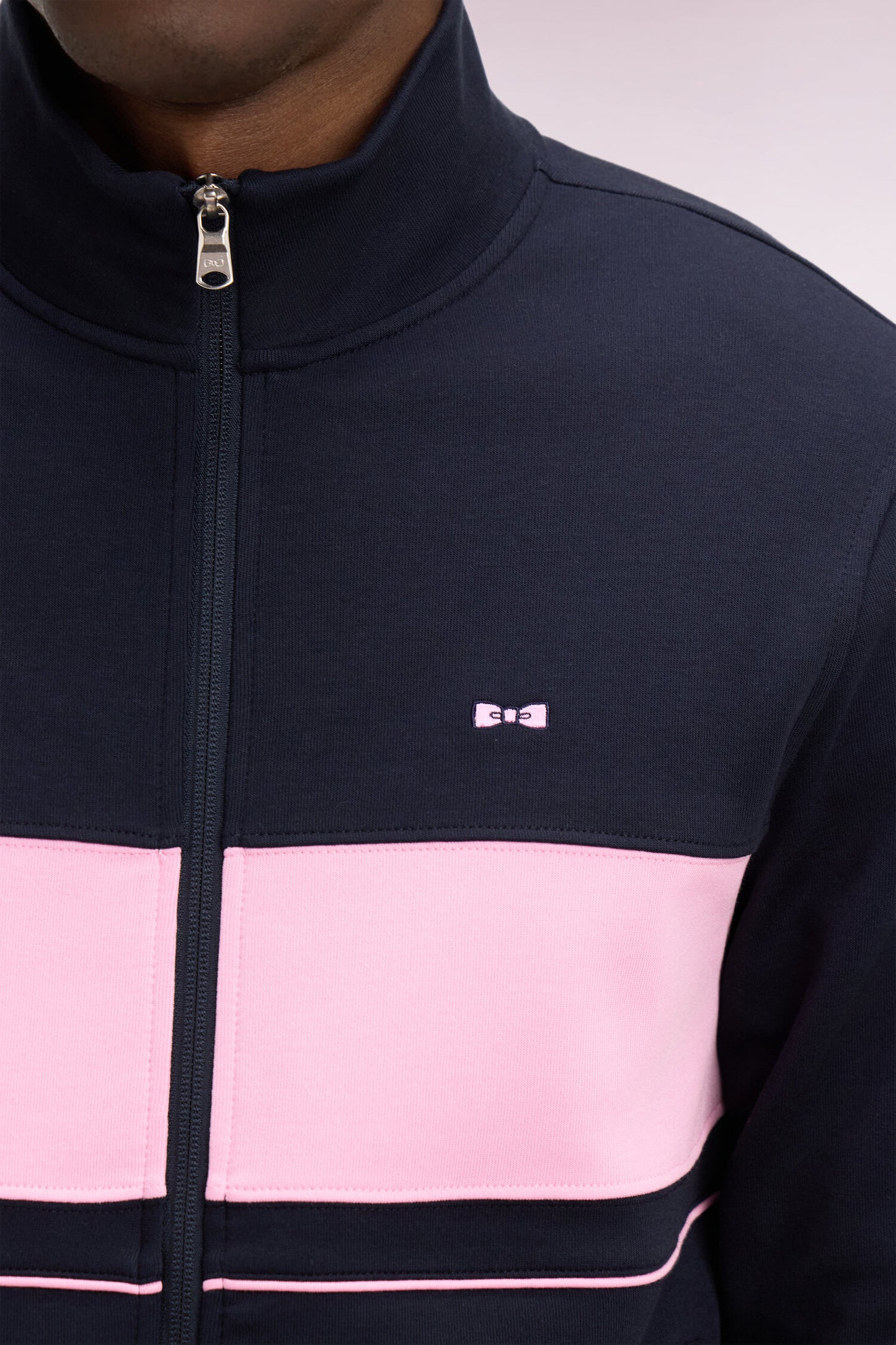 Sweatshirt zippé en molleton marine bande rose