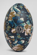 Navy blue rugby ball with floral motifs