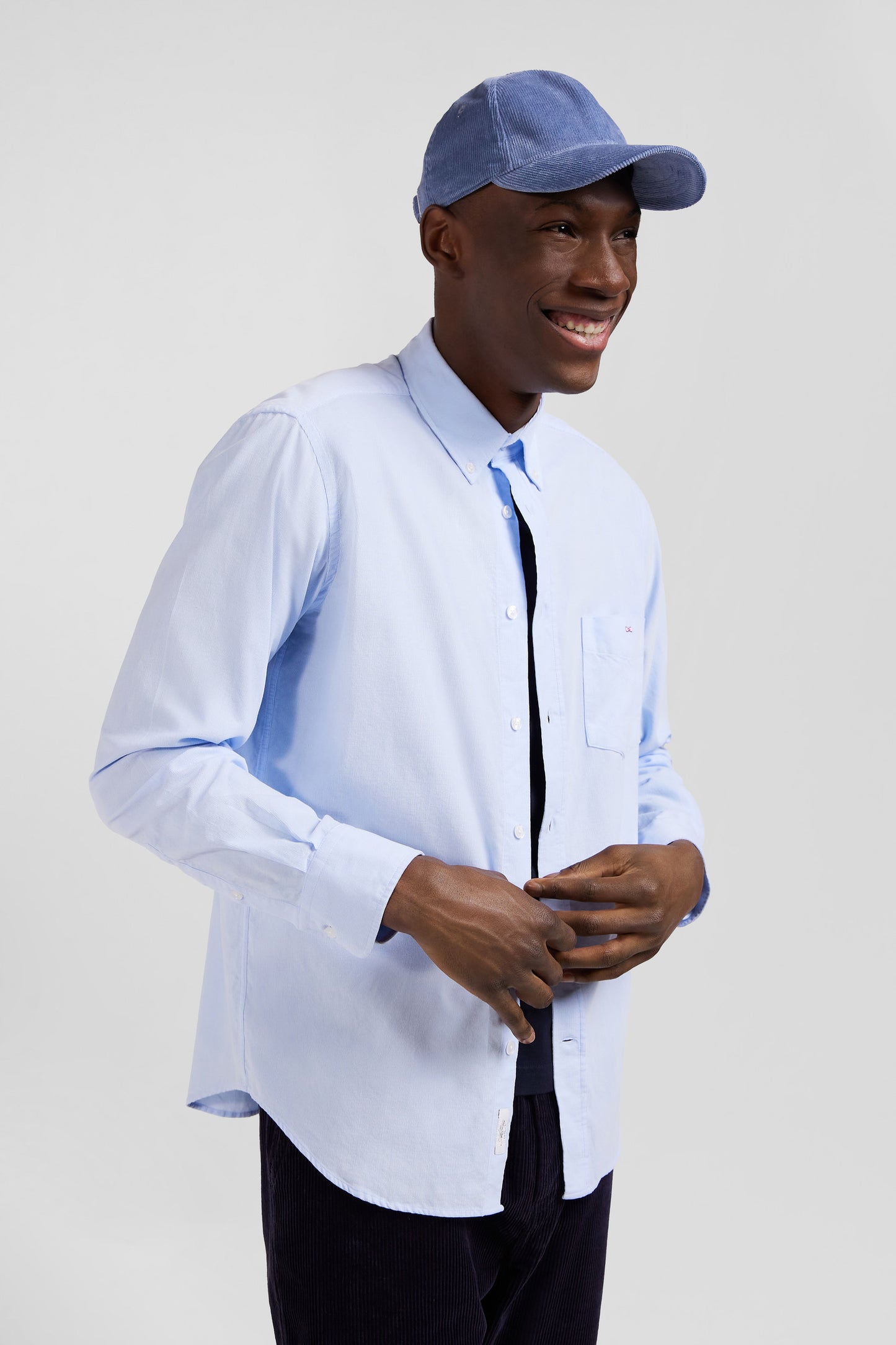 Regular plain sky blue cotton shirt with button-down collar and chest pocket