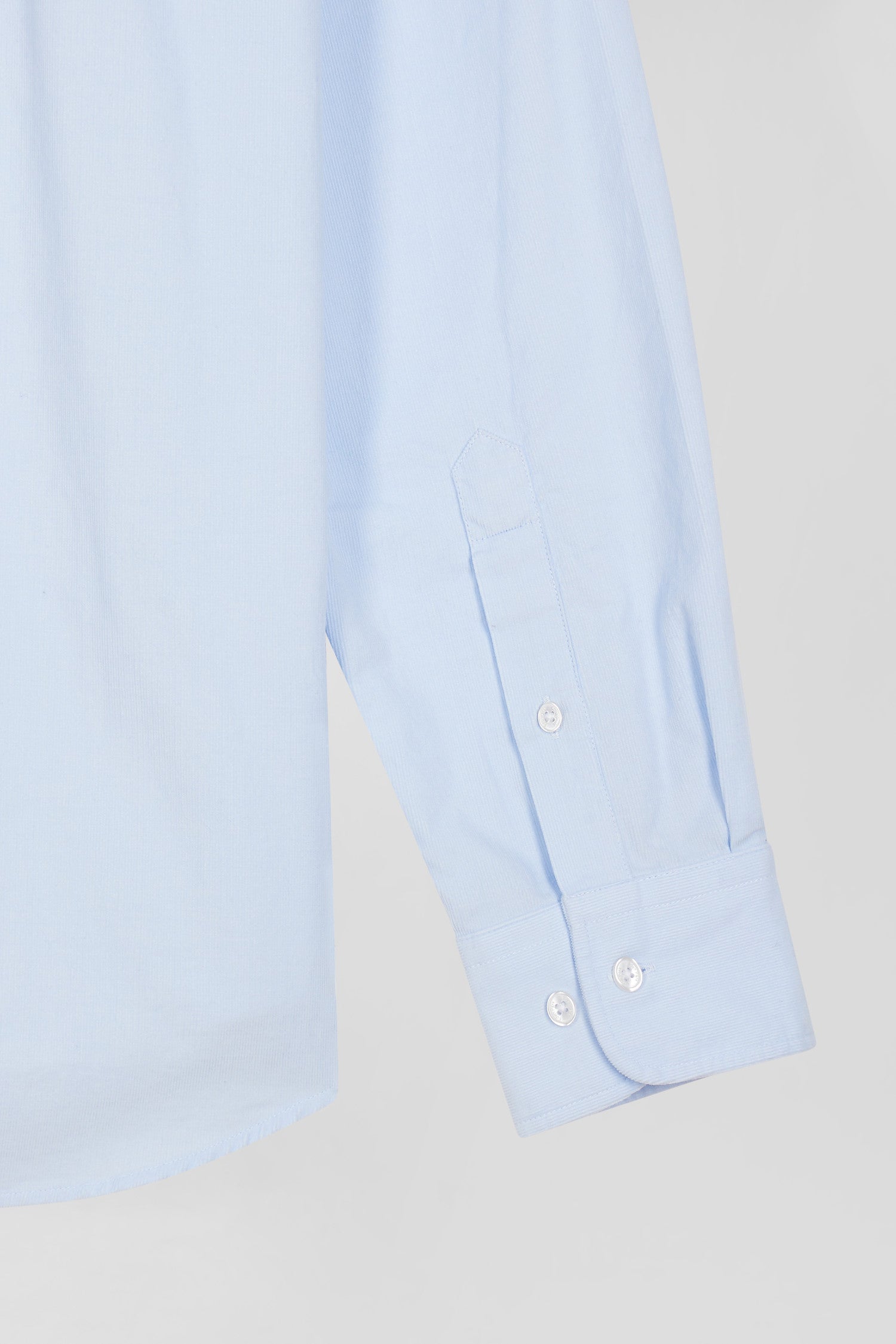 Regular plain sky blue cotton shirt with button-down collar and chest pocket