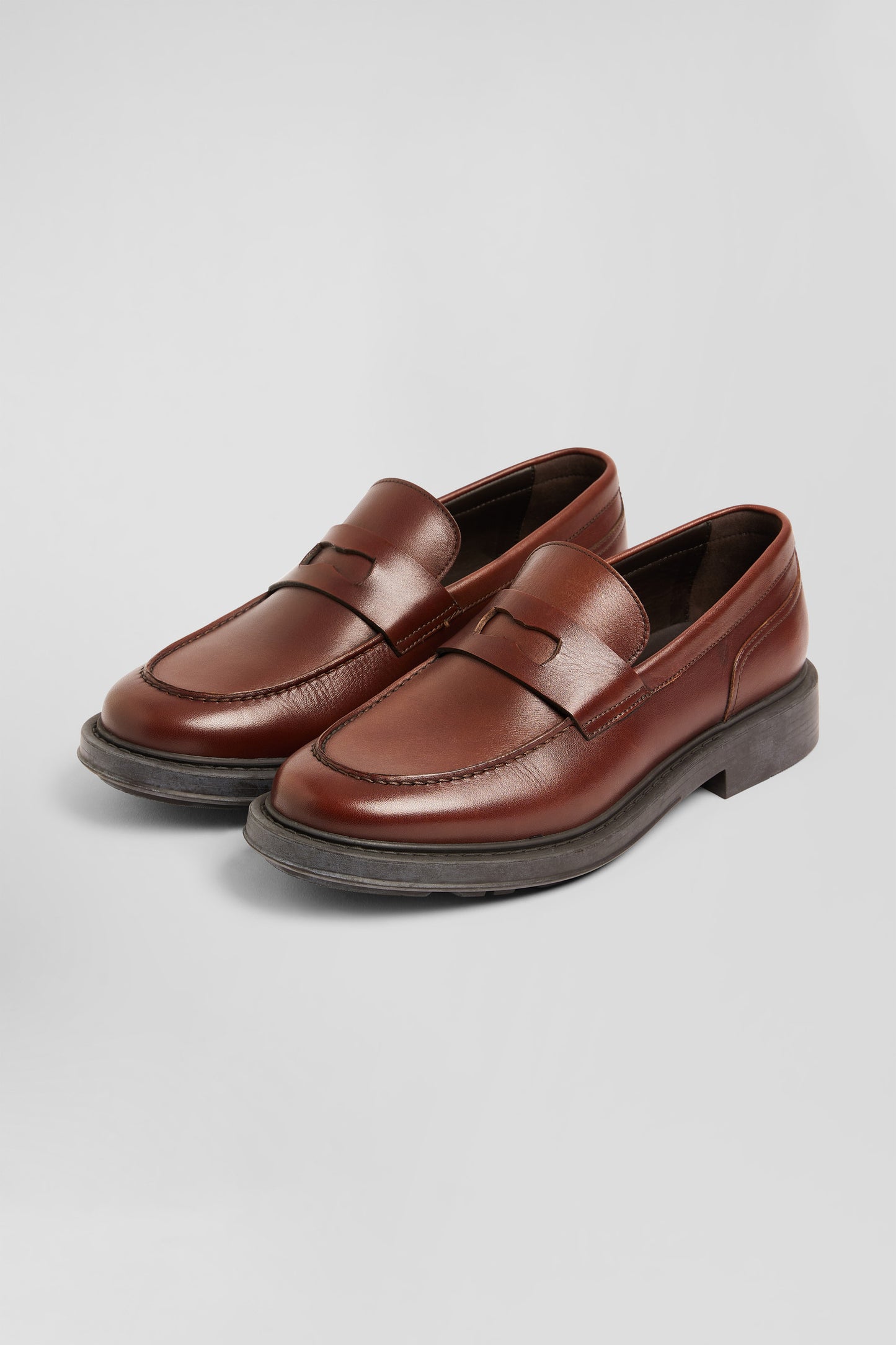 Brown polished leather loafers