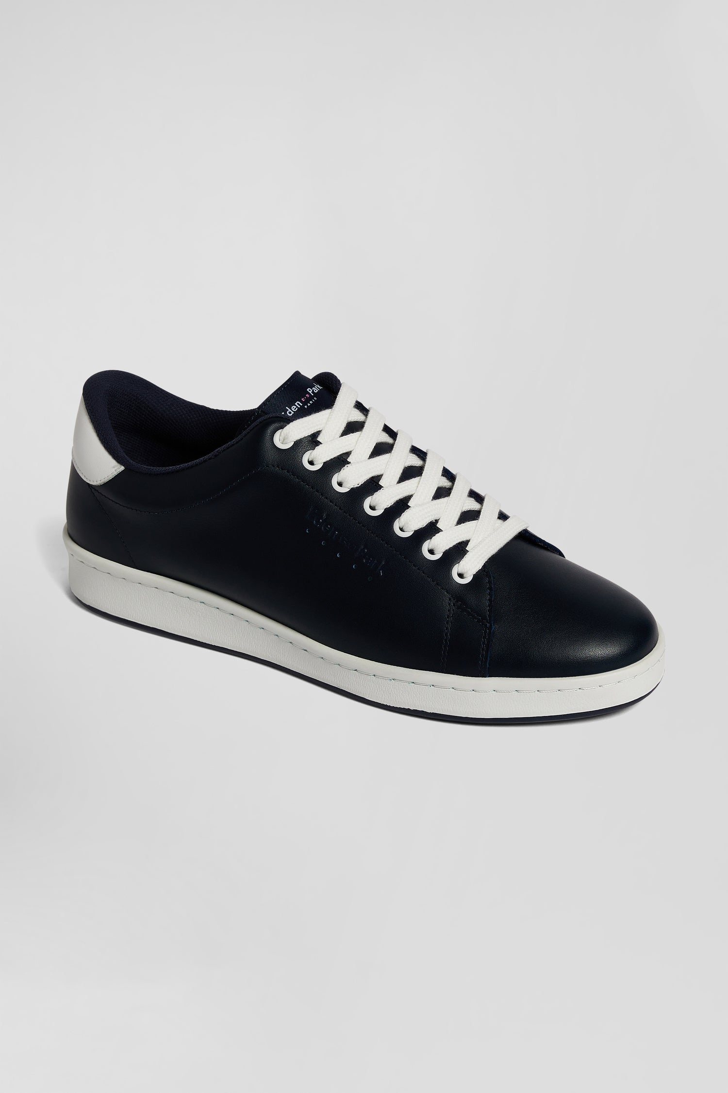 Navy blue low-top leather sneakers