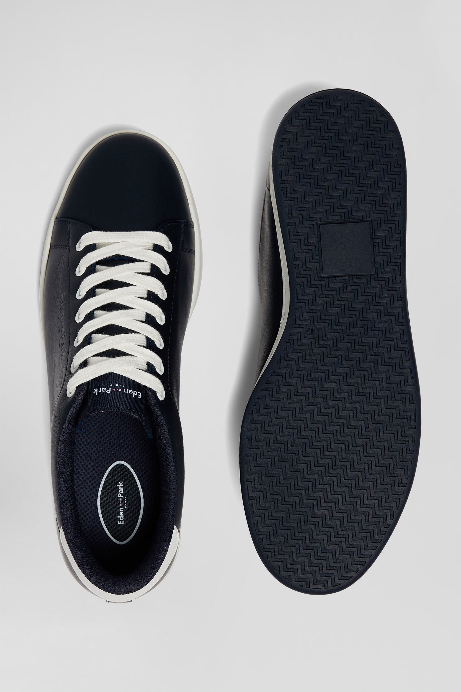 Navy blue low-top leather sneakers