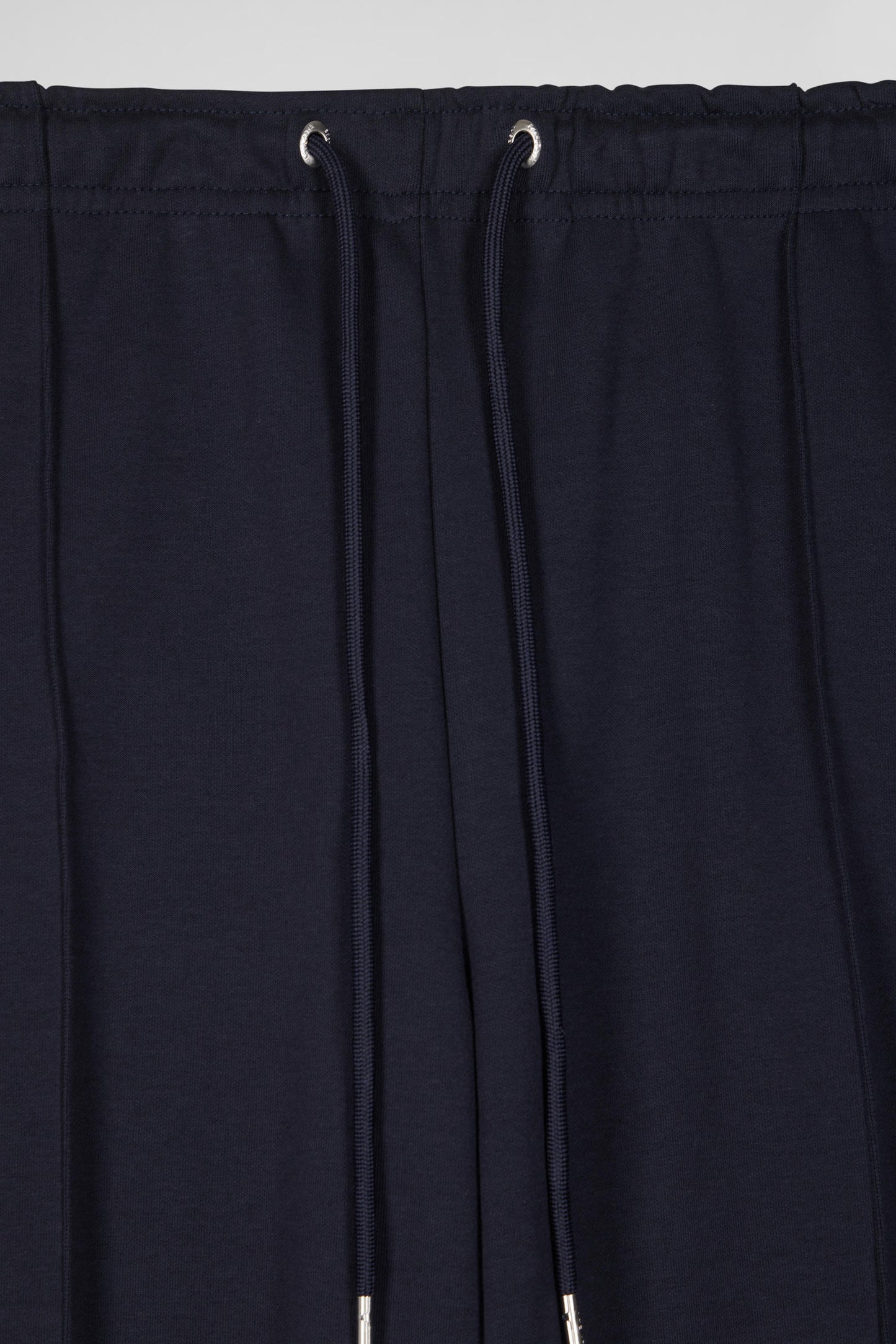 Regular navy blue mixed cotton jogging bottoms with pink piping