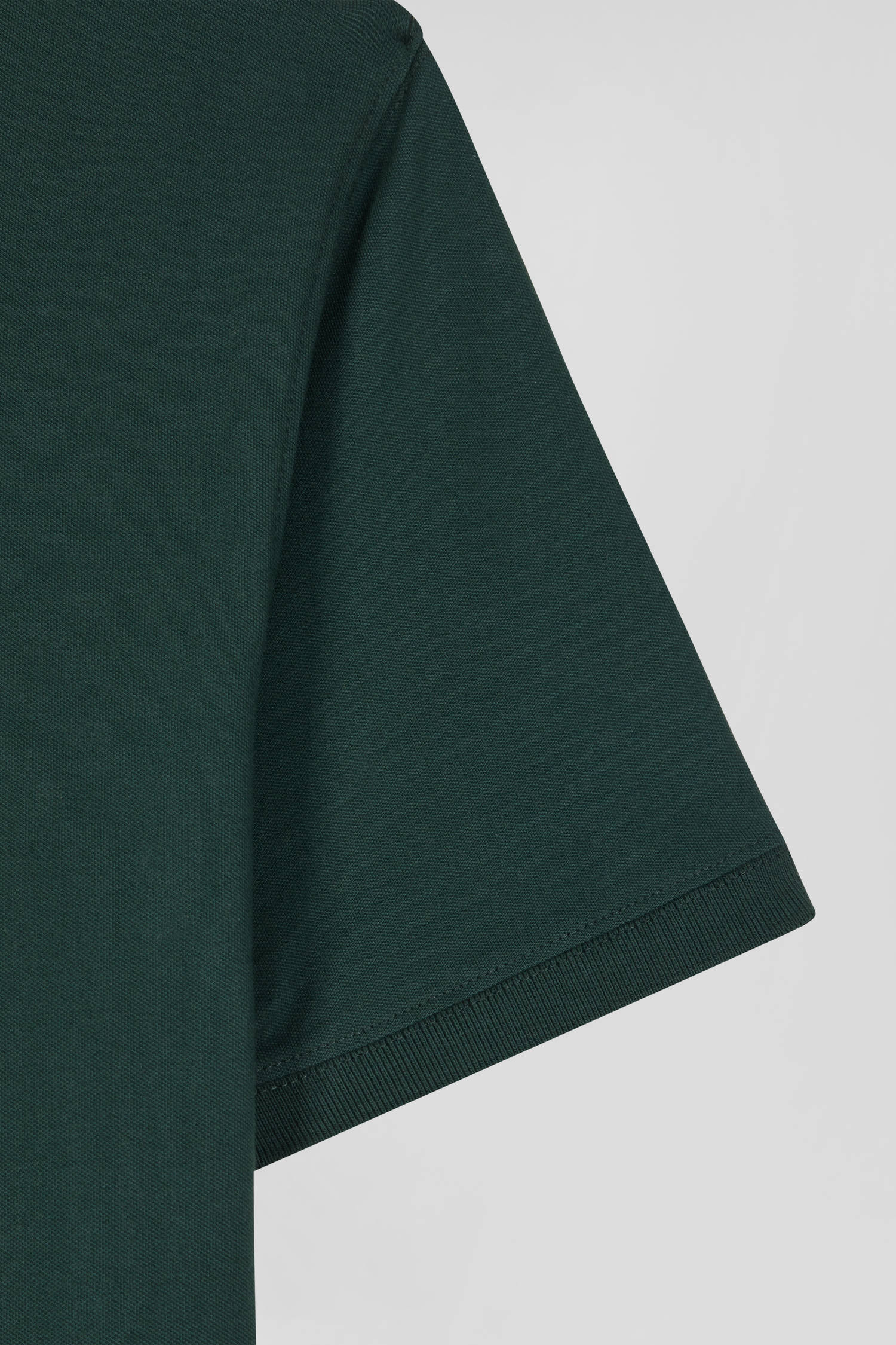 Slim green short-sleeved cotton piqué polo shirt