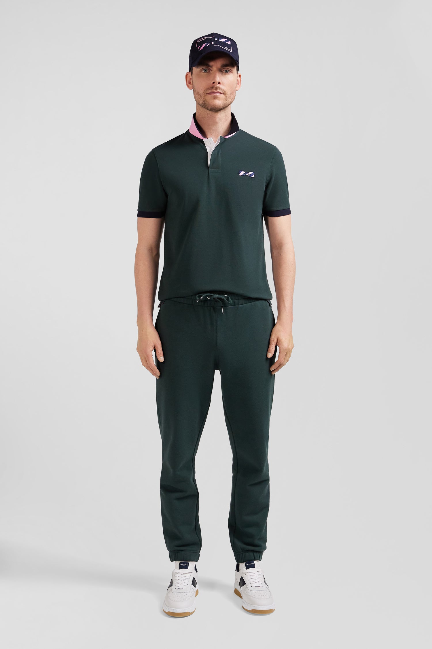 Regular green short-sleeved cotton piqué polo shirt with striped embroidery