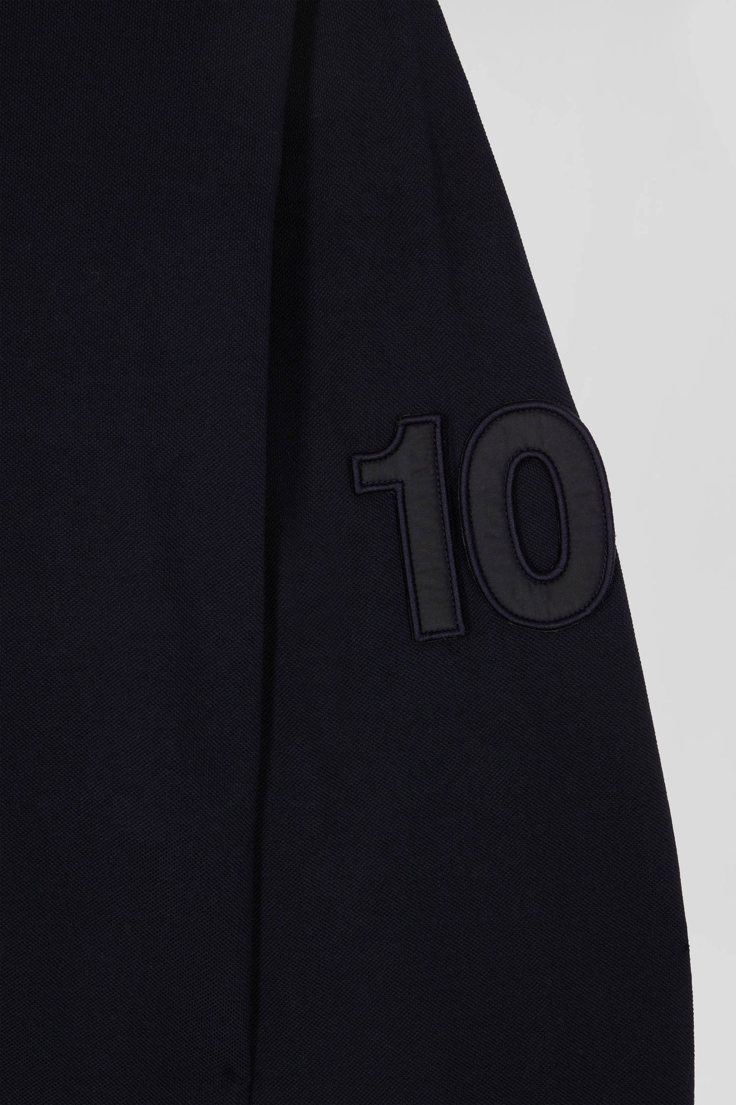 Regular navy blue long-sleeved cotton piqué polo shirt with padded embroidery