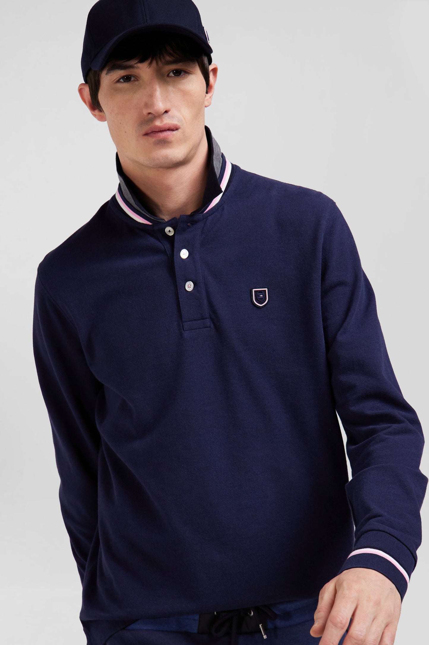 Regular navy blue long-sleeved cotton piqué polo shirt with rubber badge