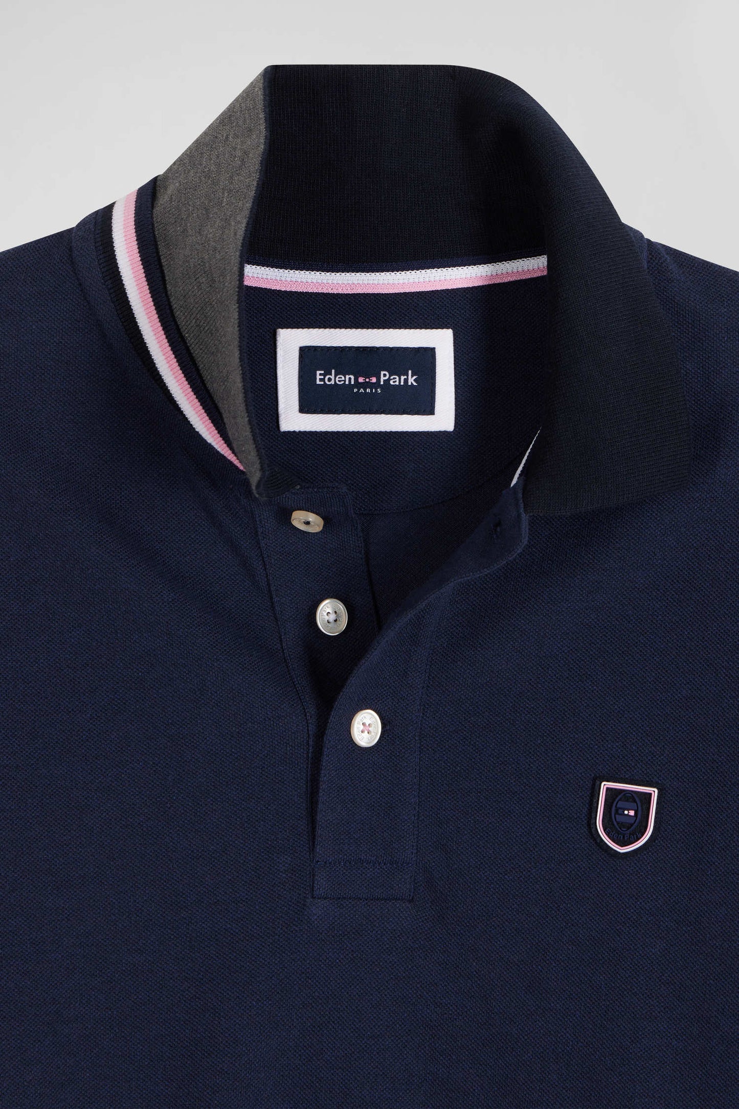 Regular navy blue long-sleeved cotton piqué polo shirt with rubber badge