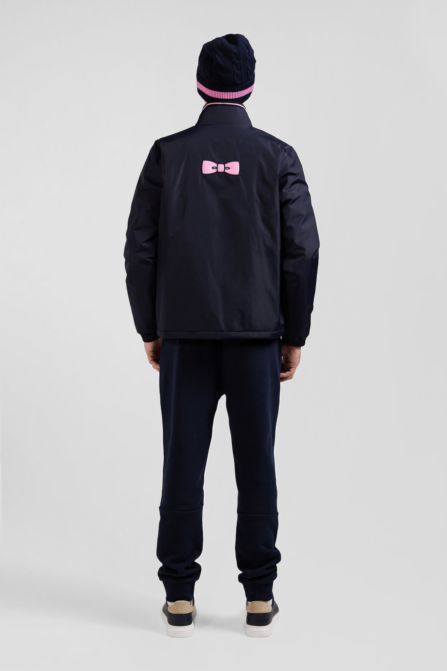 Navy blue matte nylon windbreaker with striped back embroidery