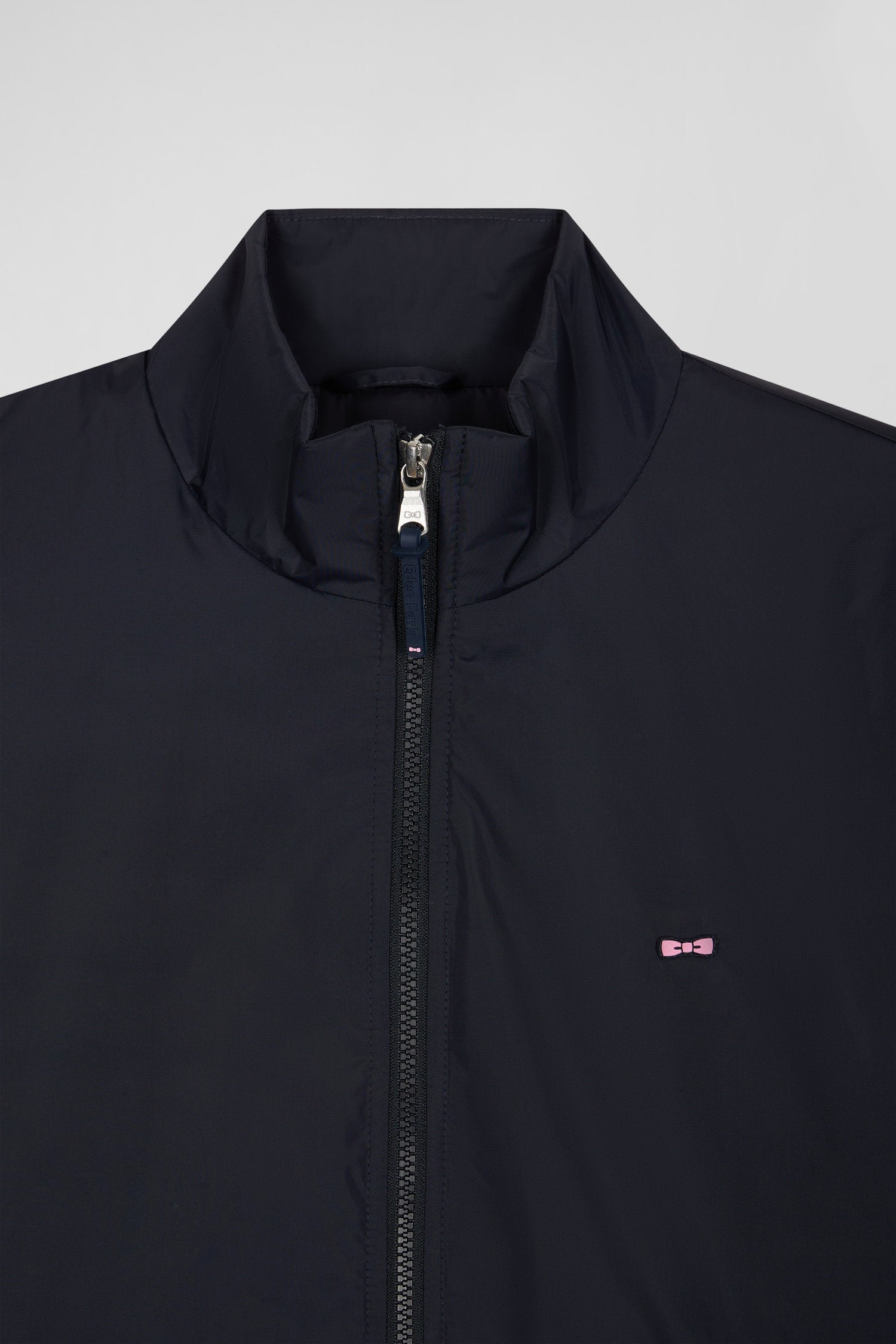 Navy blue matte nylon windbreaker with striped back embroidery