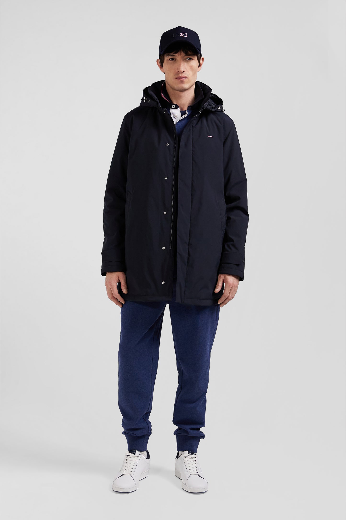 Navy blue hooded nylon raincoat