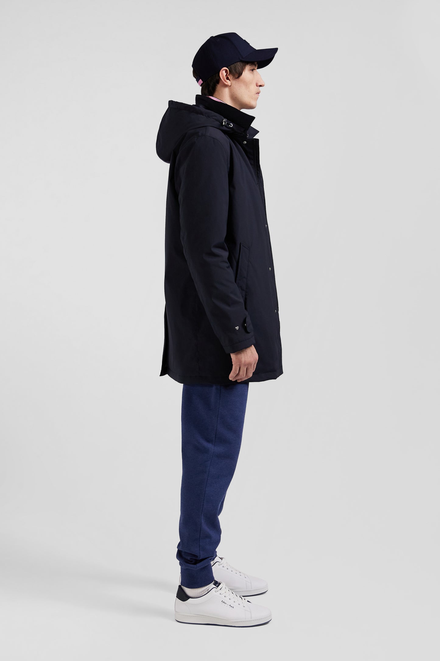 Navy blue hooded nylon raincoat