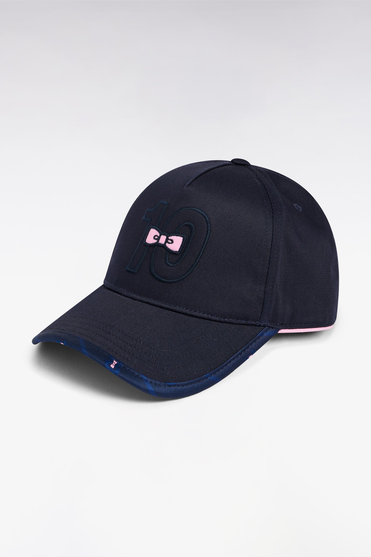 Casquette en piqué coton marine broderie rose