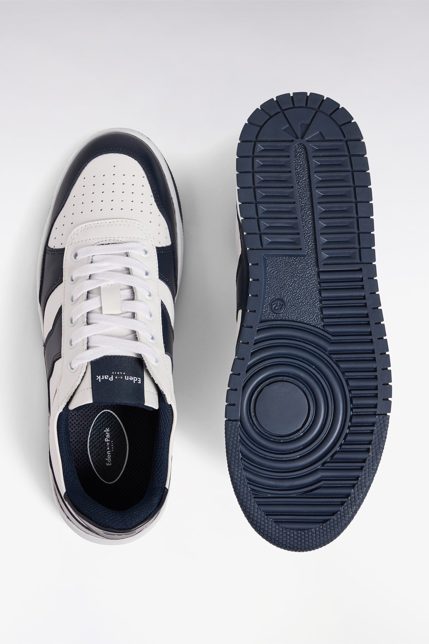Two-tone navy and white leather sneakers