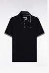 Polo manches courtes en coton noir détails rayés coupe ample