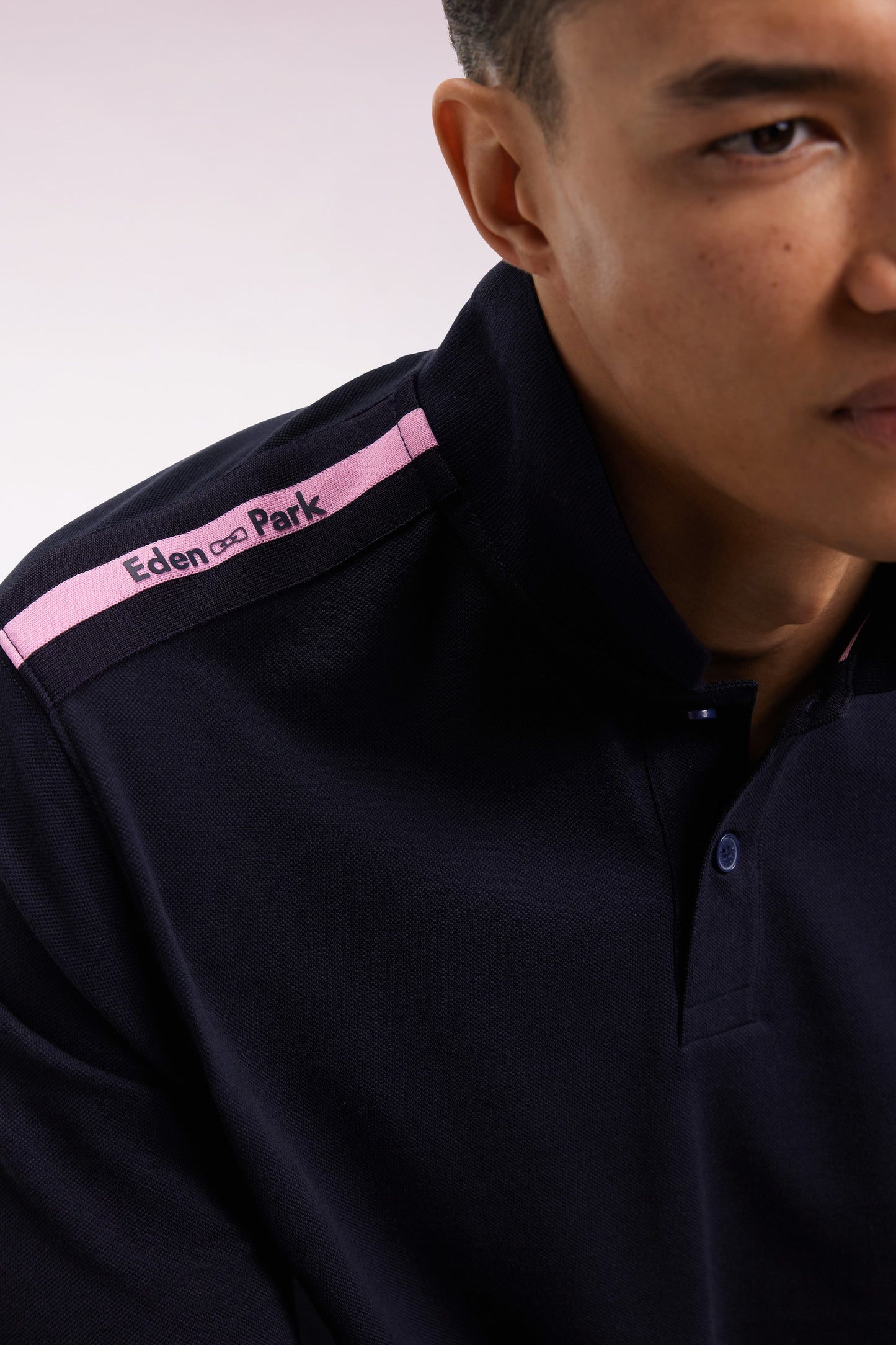 Polo à manches longues en piqué coton marine galon rose siglé