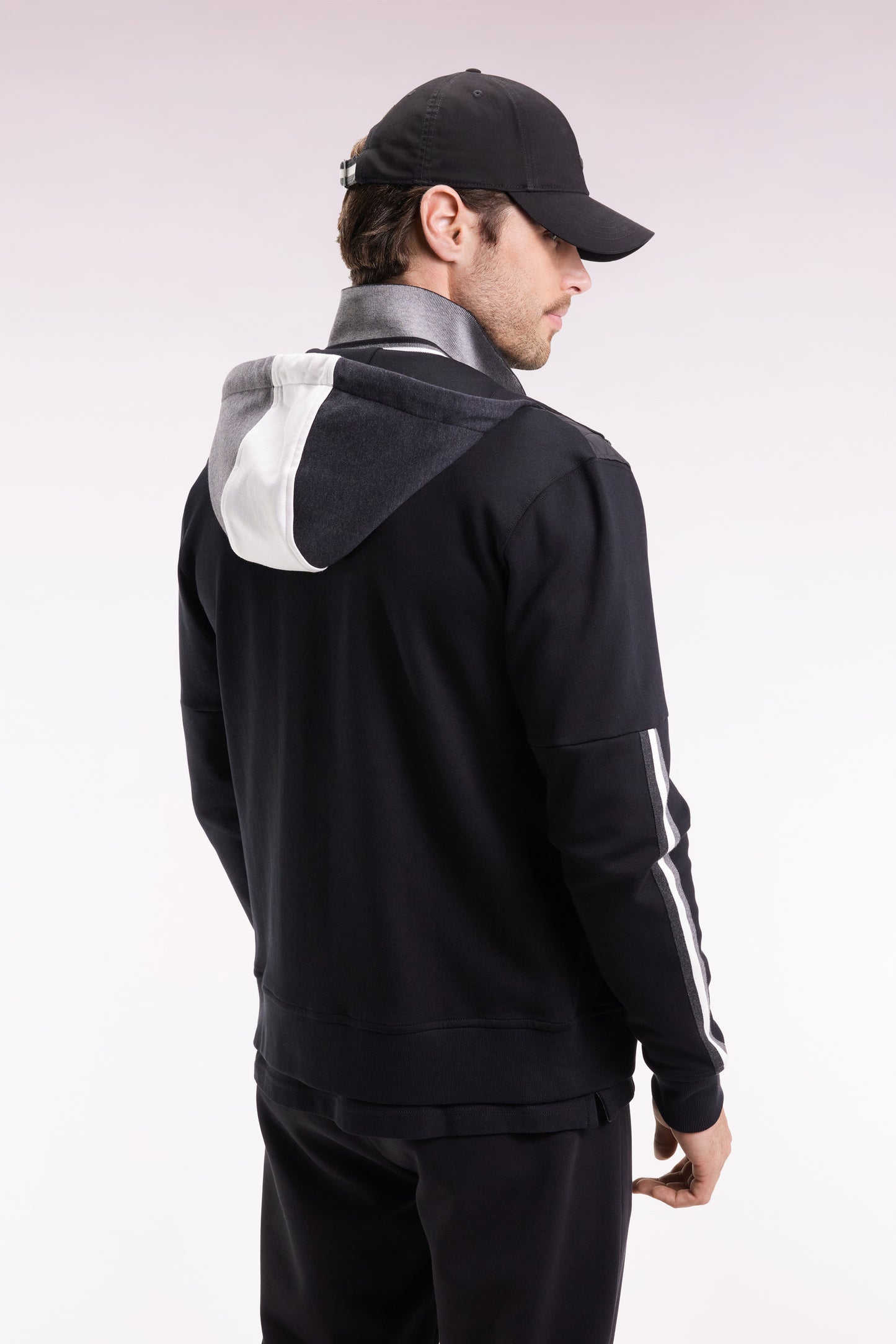 Zipped sweatshirt in black and grey quilted bimaterial interlock