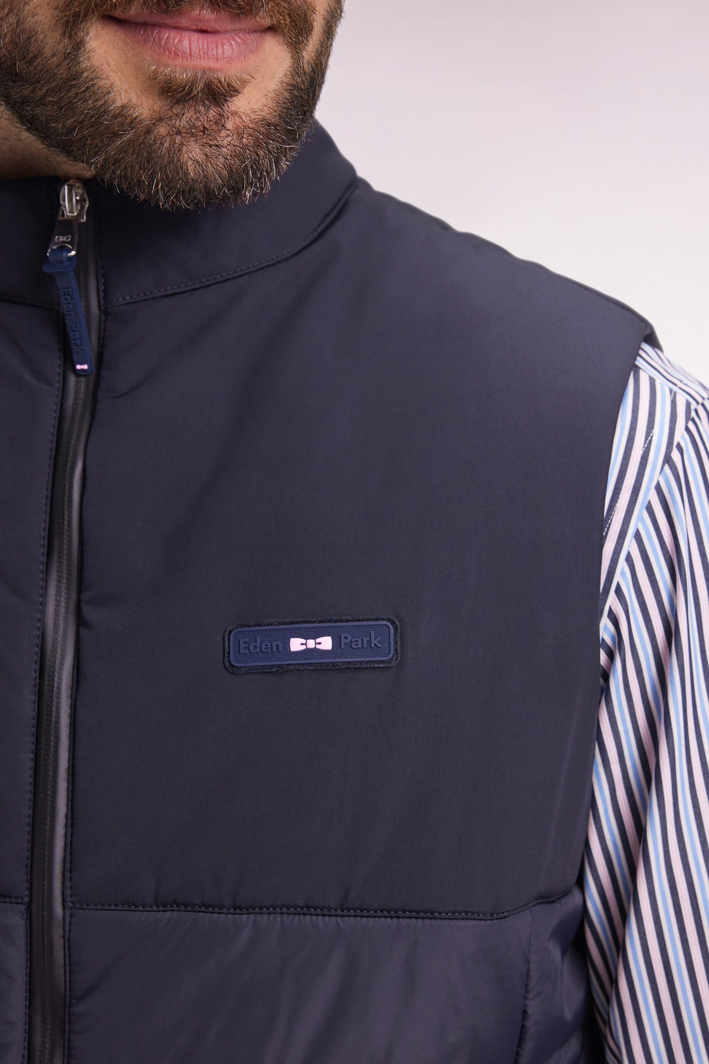 Navy two-material sleeveless down jacket