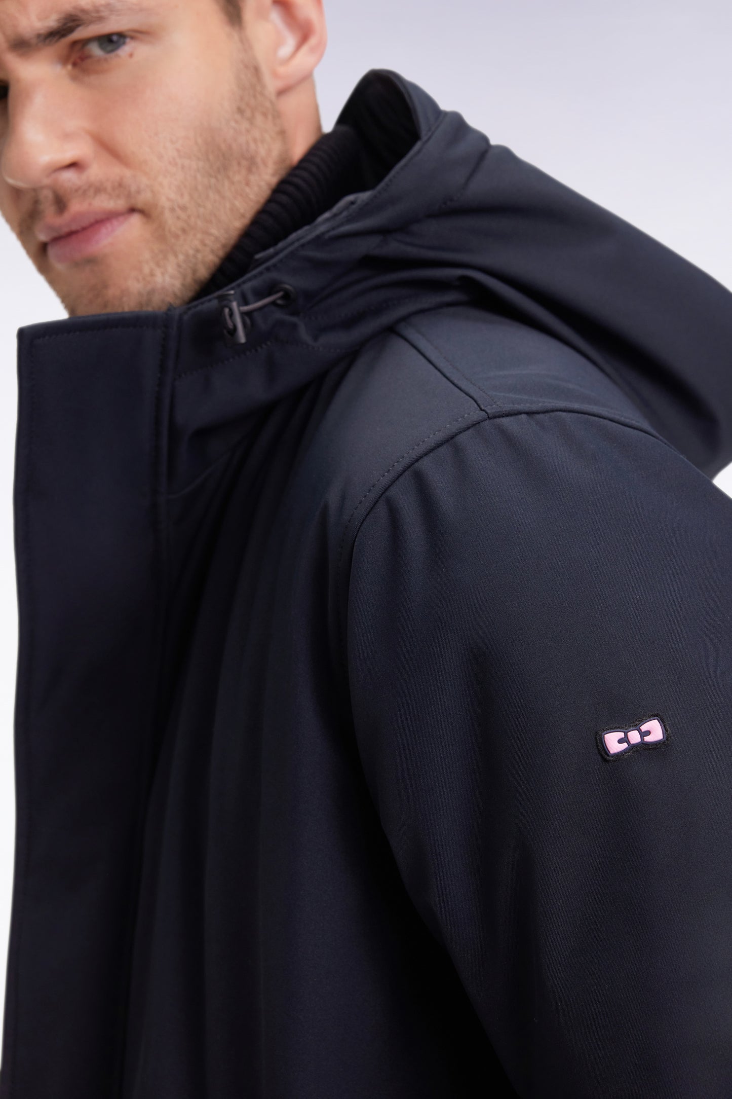 Long black nylon parka with integrated hood