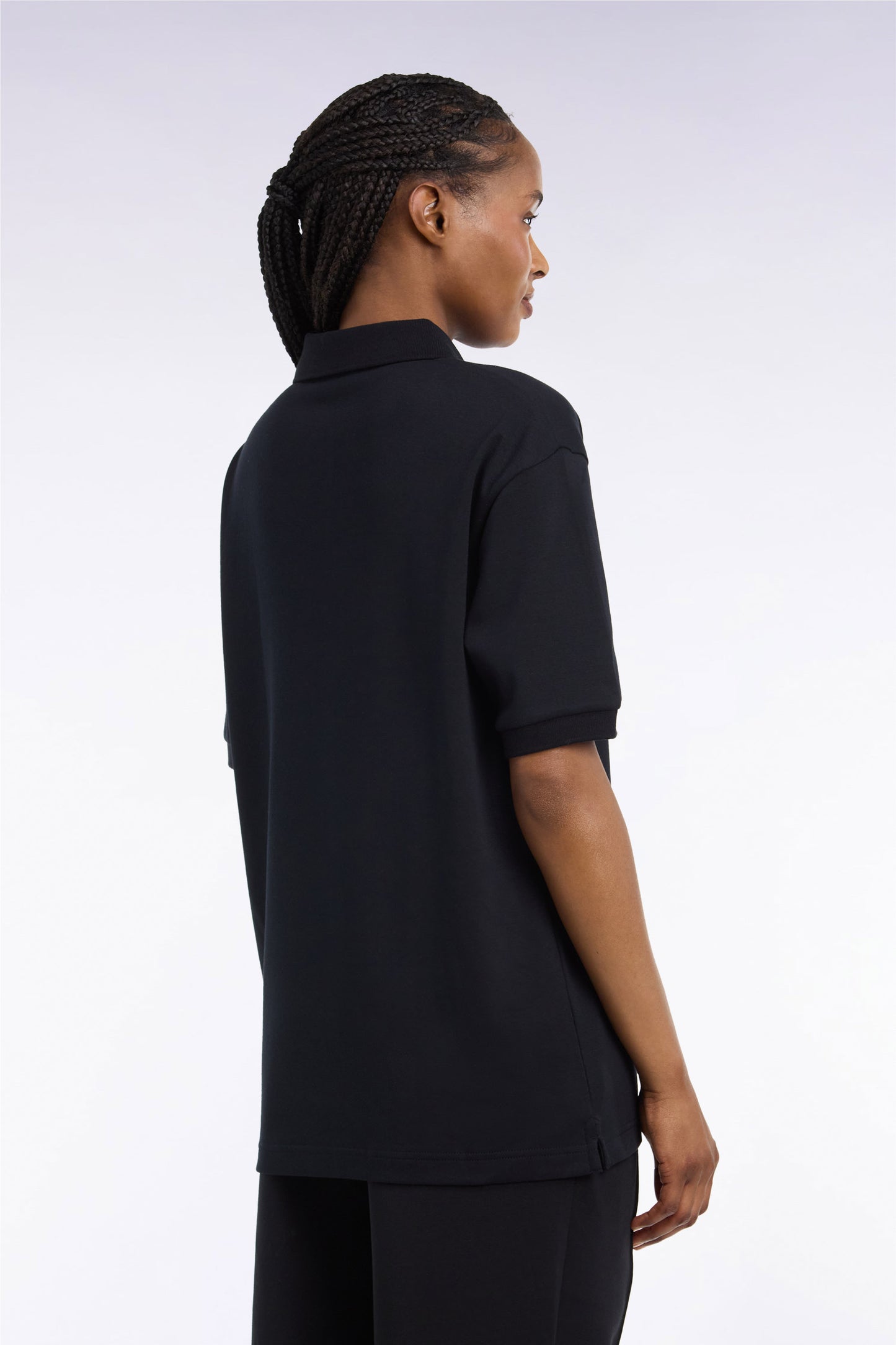 Polo unisexe manches courtes en coton interlock noir