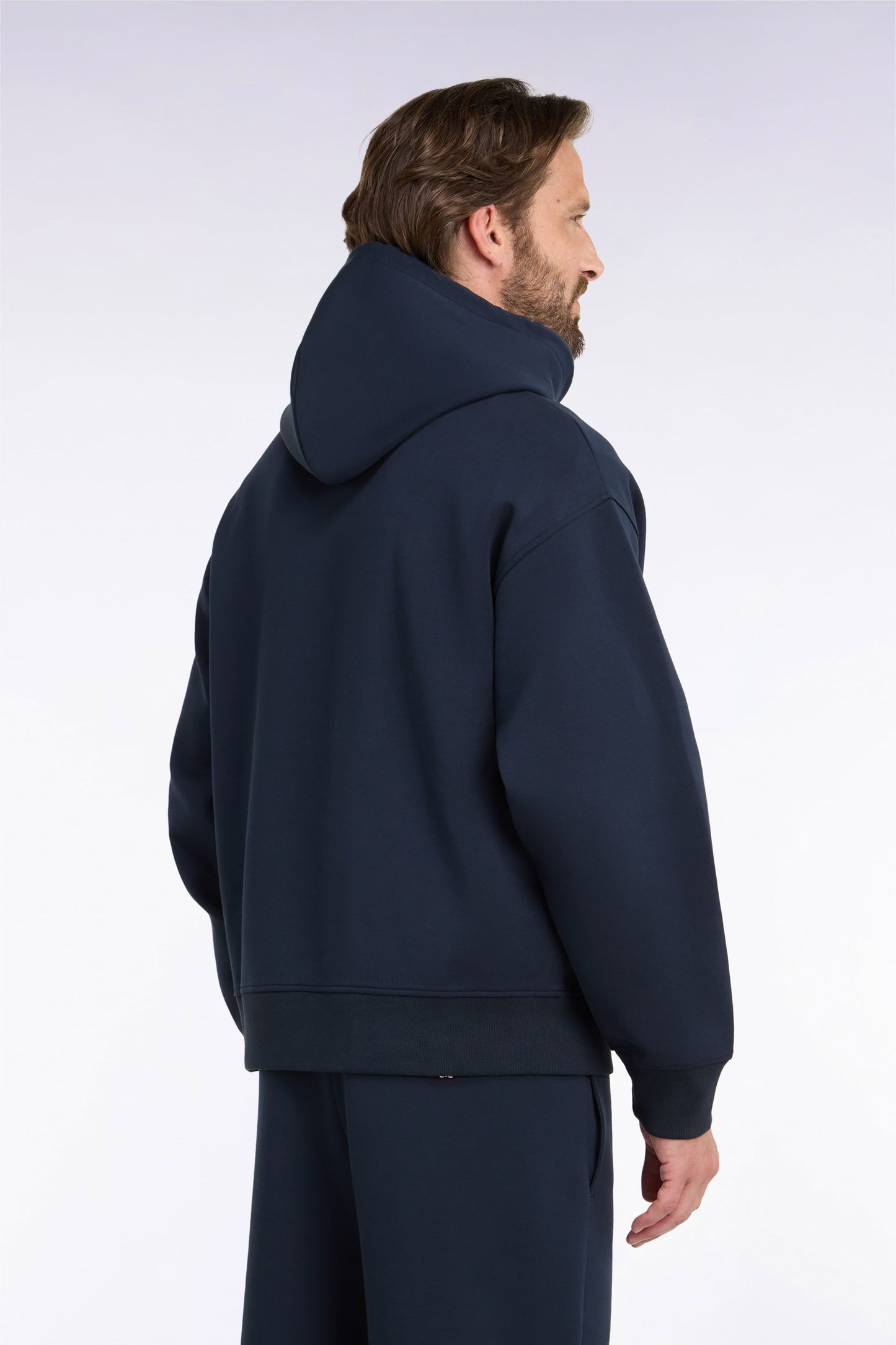 Sweatshirt à capuche unisexe en interlock marine coupe loose