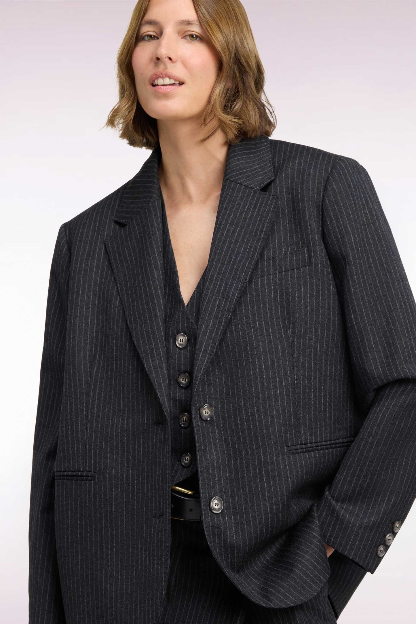Veste blazer à manches rayées en laine stretch noir coupe oversized
