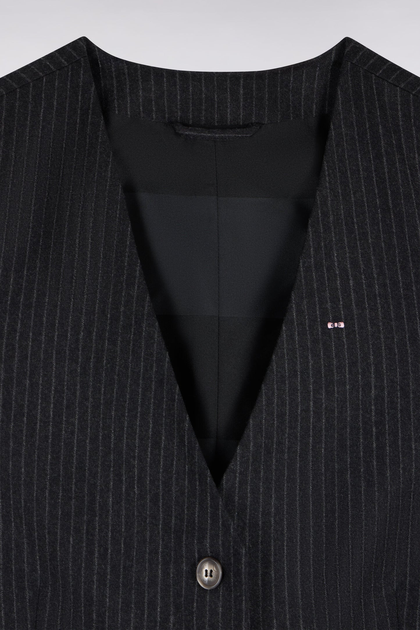 Veste blazer à manches rayées en laine stretch noir coupe oversized