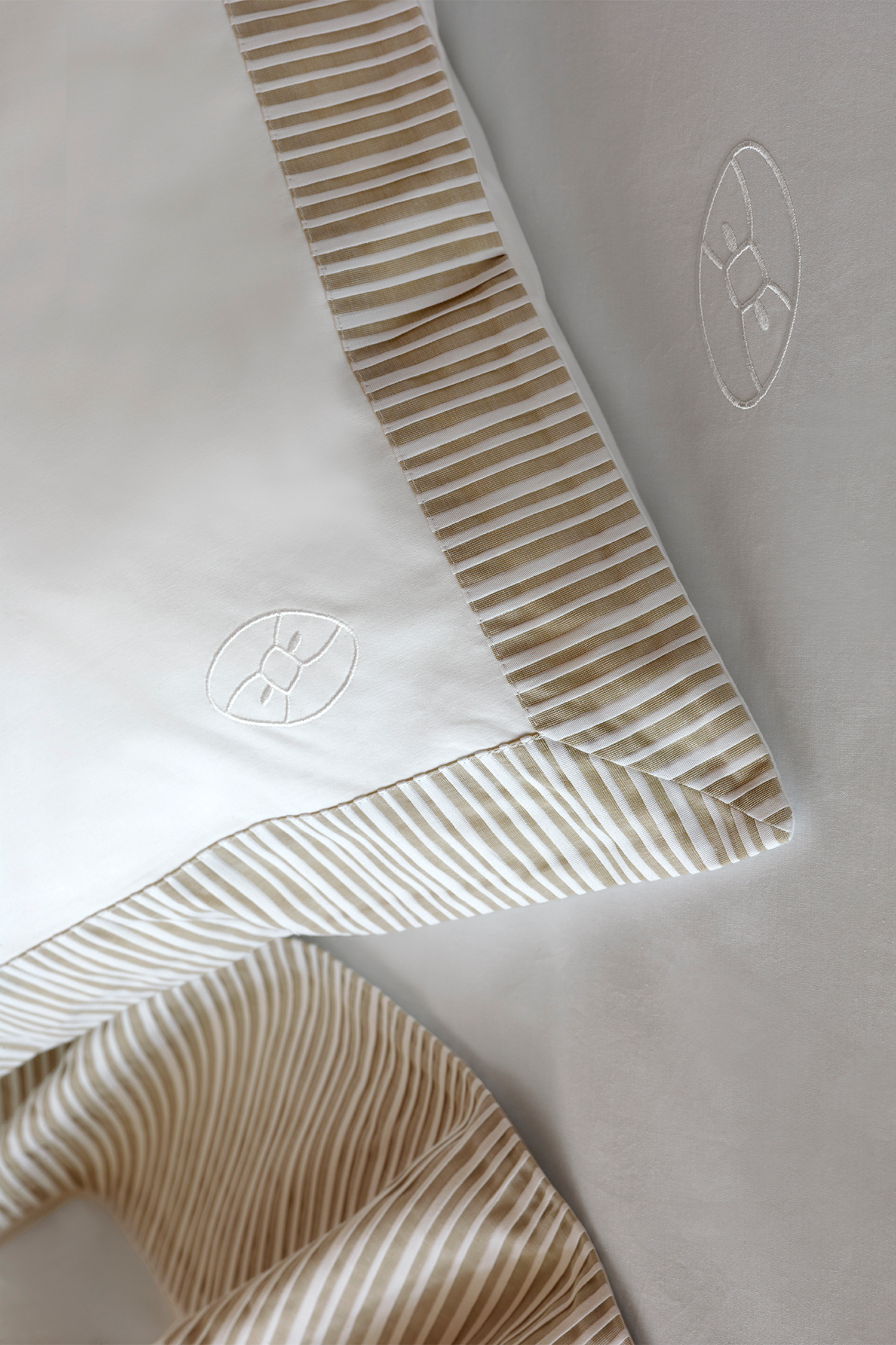 duo of square white and beige pillow case