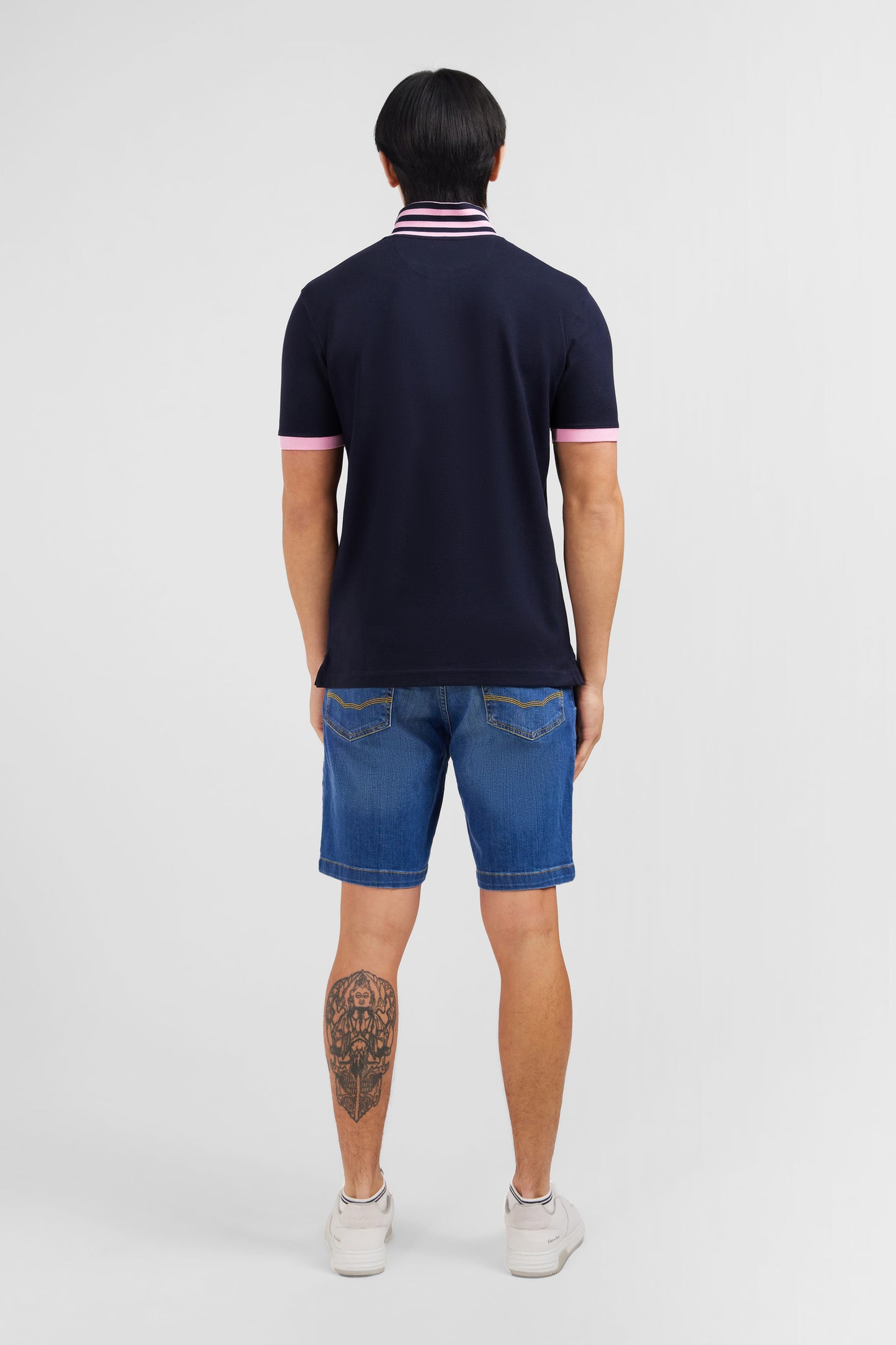 Navy blue pima cotton polo with contrasting accents