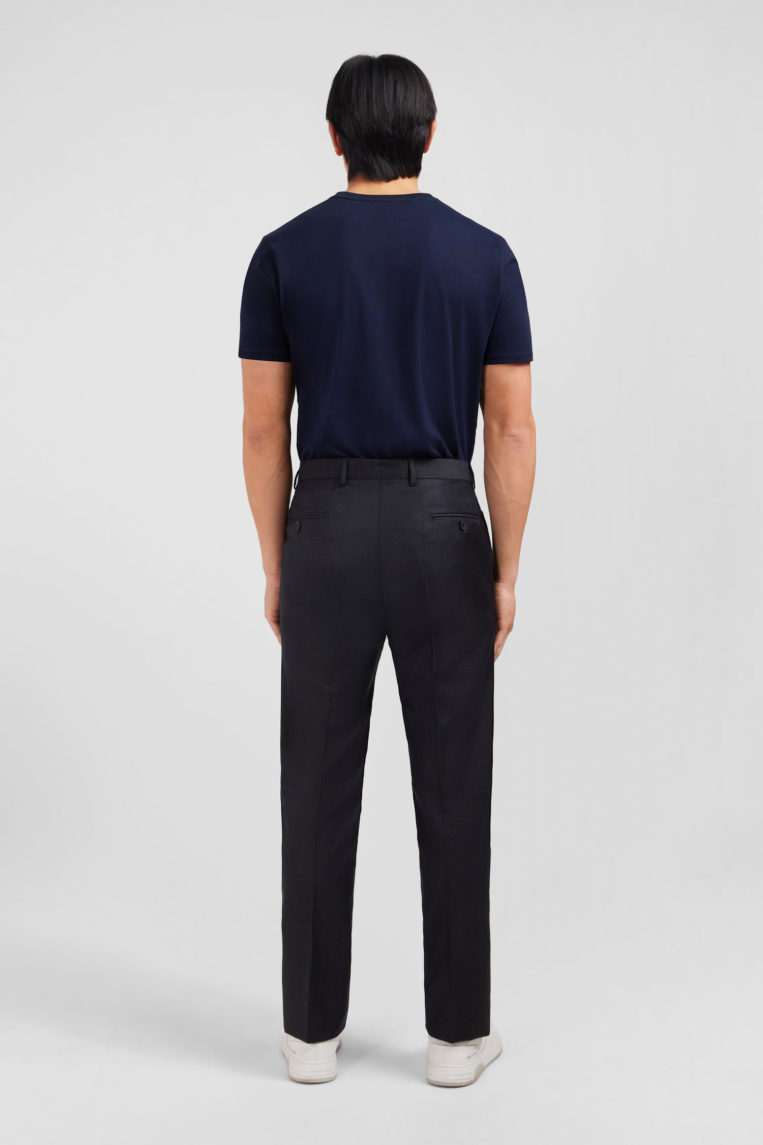 Regular dark grey wool trousers with broken fold