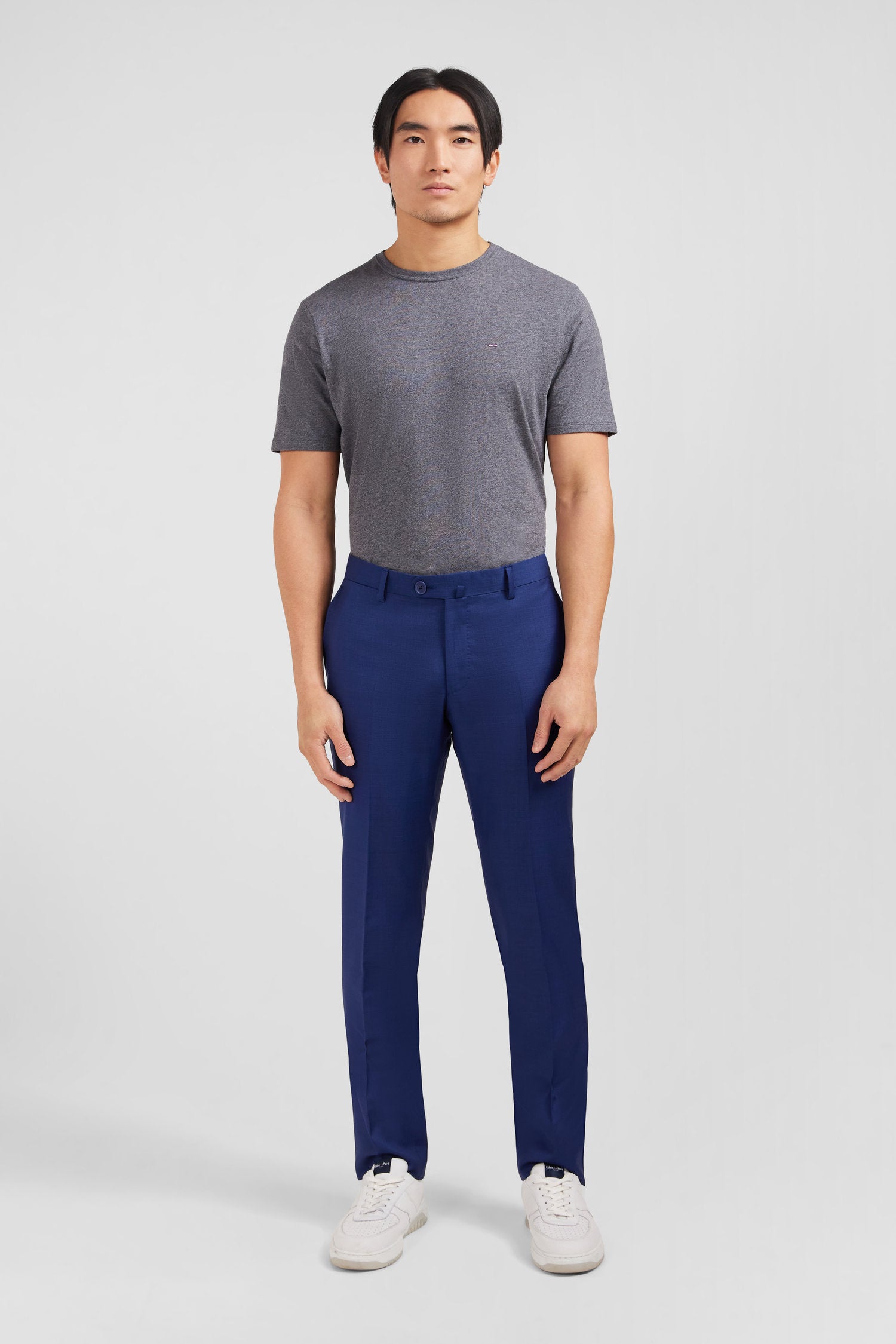 Slim blue wool trousers with broken fold