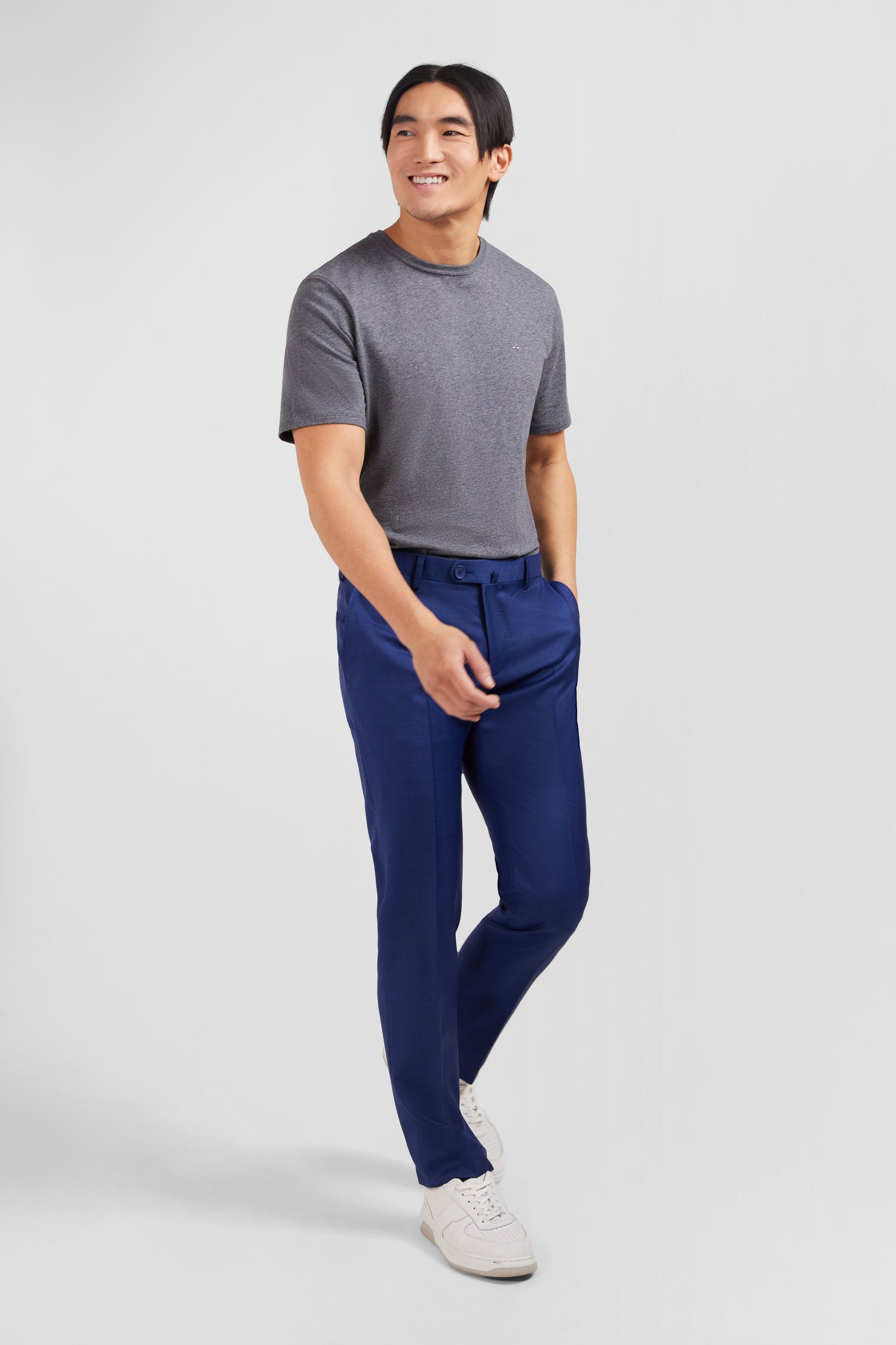 Slim blue wool trousers with broken fold