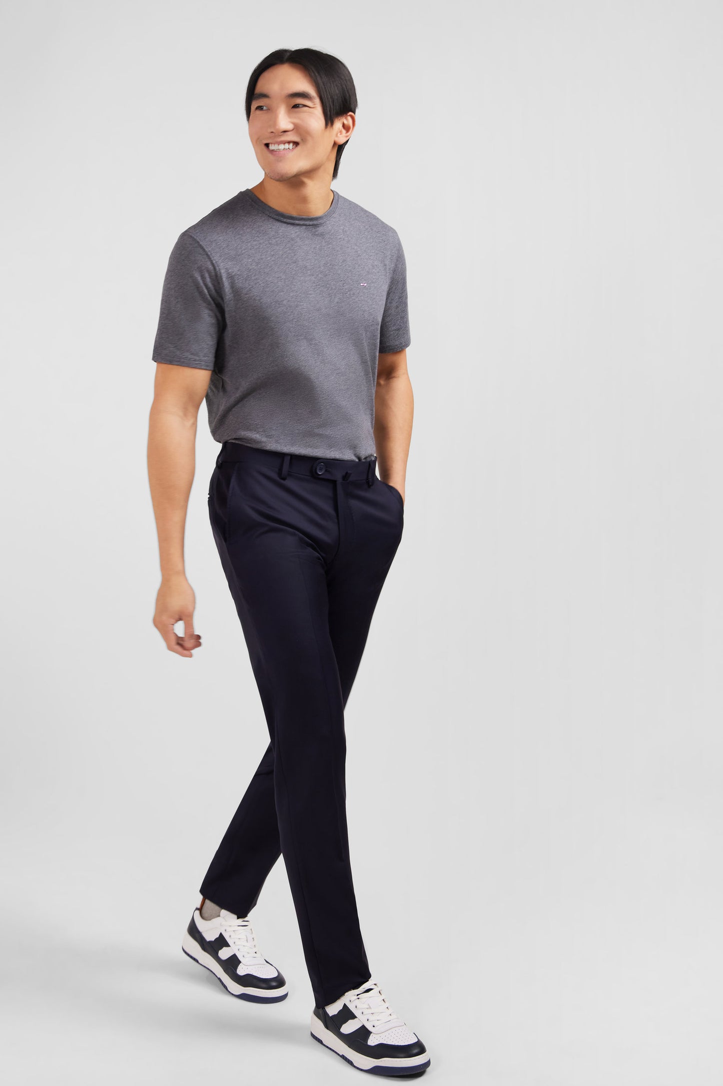 Slim dark blue wool trousers with broken fold